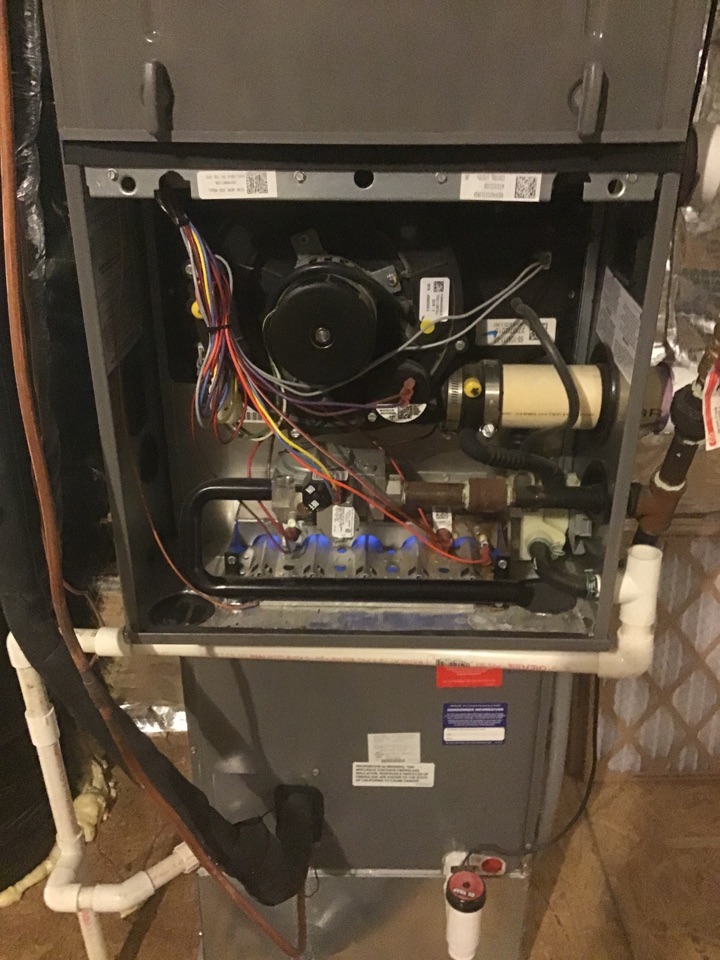 Performing a furnace tune up. 