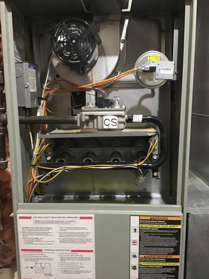 Performing a tune up on a furnace 