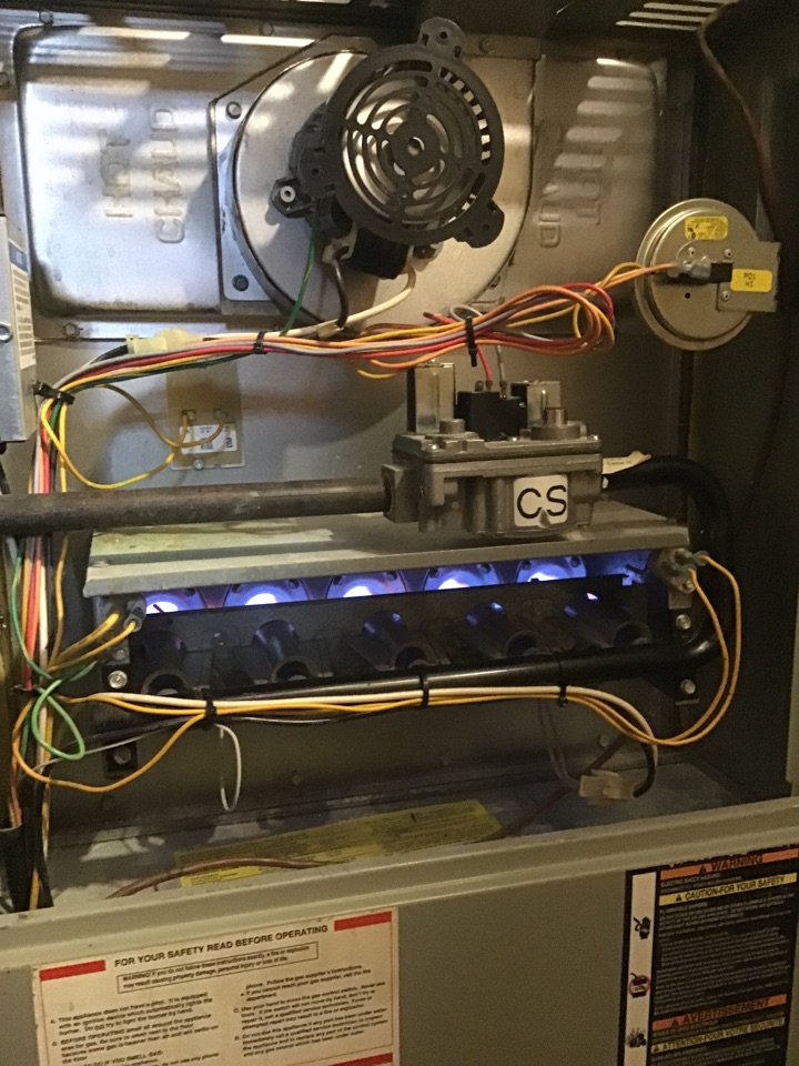 Performing a tune up on a furnace 