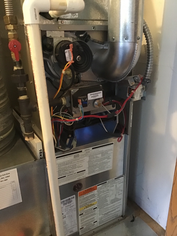 Performing a preventative maintenance tune up on a Bryant furnace for Mrs.Warner
