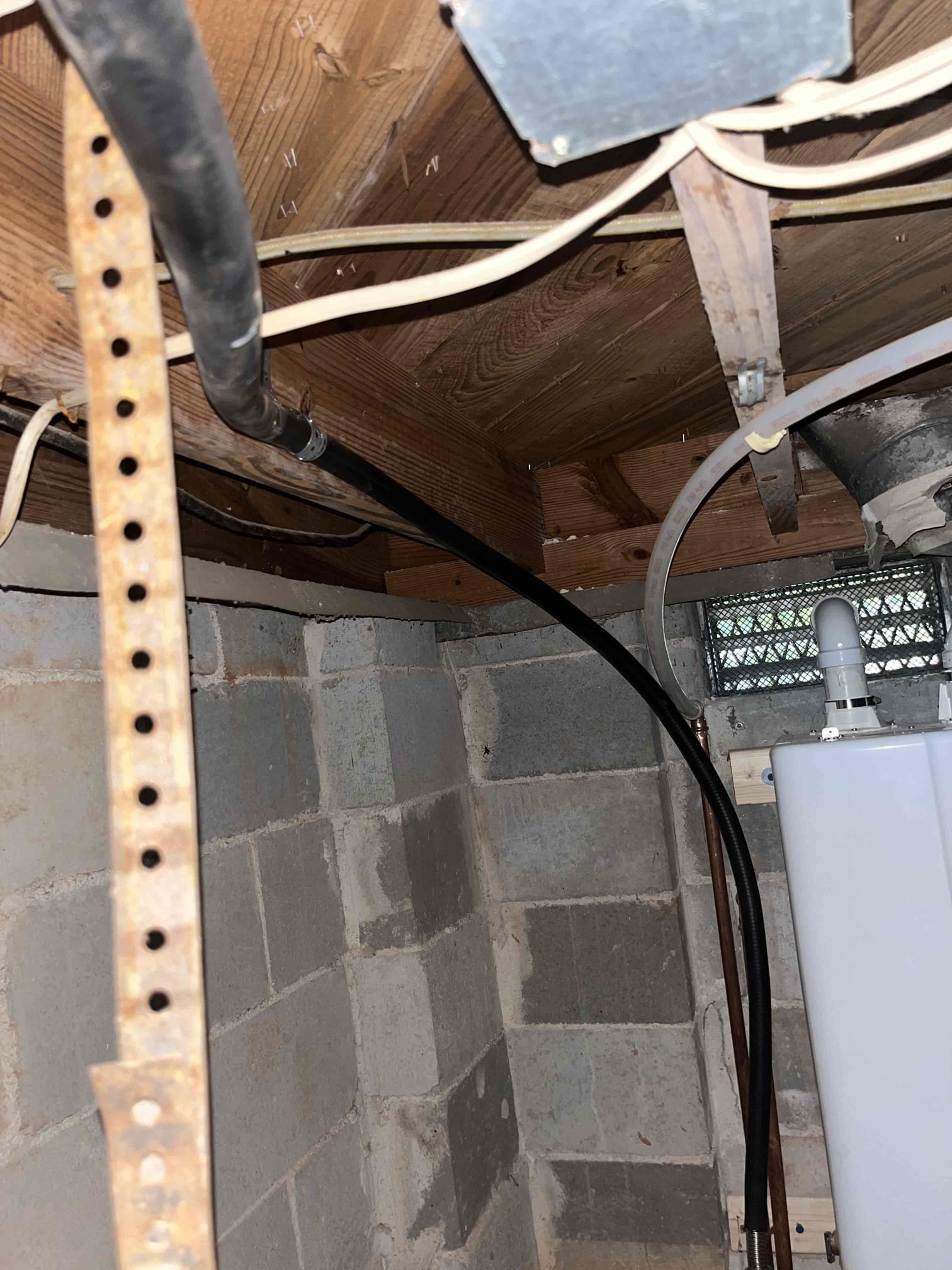 Price is to furnish and install Navien tankless unit to existing gas, water, and new venting in according with national and state code requirements. Price includes provision, mounting, connections, and any lines that need to be run to the unit, as well as penetrations for venting to the exterior of the home. 

Returned and installed new Navien tankless water heater with a new service valve kit, thermal expansion device, and condensate pump. Made new penetrations to the exterior of the home for the vent, condensate, and t&p. Ran new gas and water lines to the unit. Tested all work to ensure proper function and no leaks. None were found. Upon testing the t&p found that water is leaking into the crawlspace in the ground where the condensate pump is sitting. Made customer aware that getting a foundation company to inspect the crawlspace seal is crucial to protecting the new equipment. 
