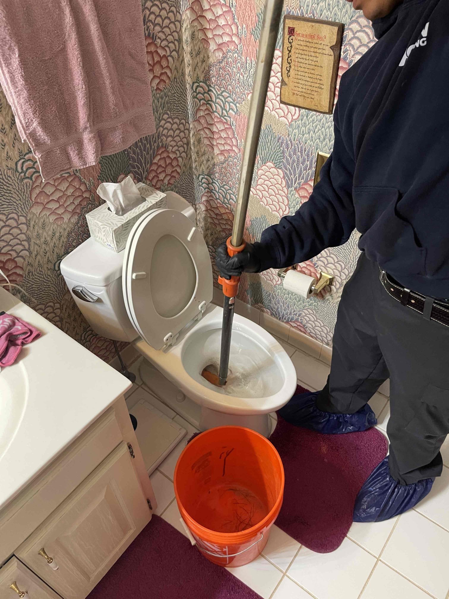 Two clogged toilets. Nothing backing up into any other fixtures in the house. Attempted auger. After multiple flushes it started working. Had nothing to do with the augering which I could tell by looking at the layout of the plumbing in the unfinished basement. Found cleanout in front of house. Sewer line is 10’ deep. Ran camera for free to identify any possible buried issues as I wanted to ensure we wouldn’t get recalled at the end of the day for another back up. Dropped camera down cleanout and found sewer line coming out of the house is heavily back pitched and holding water due to house settling on hill. Left two different repair options. Notified homeowner of my findings. 