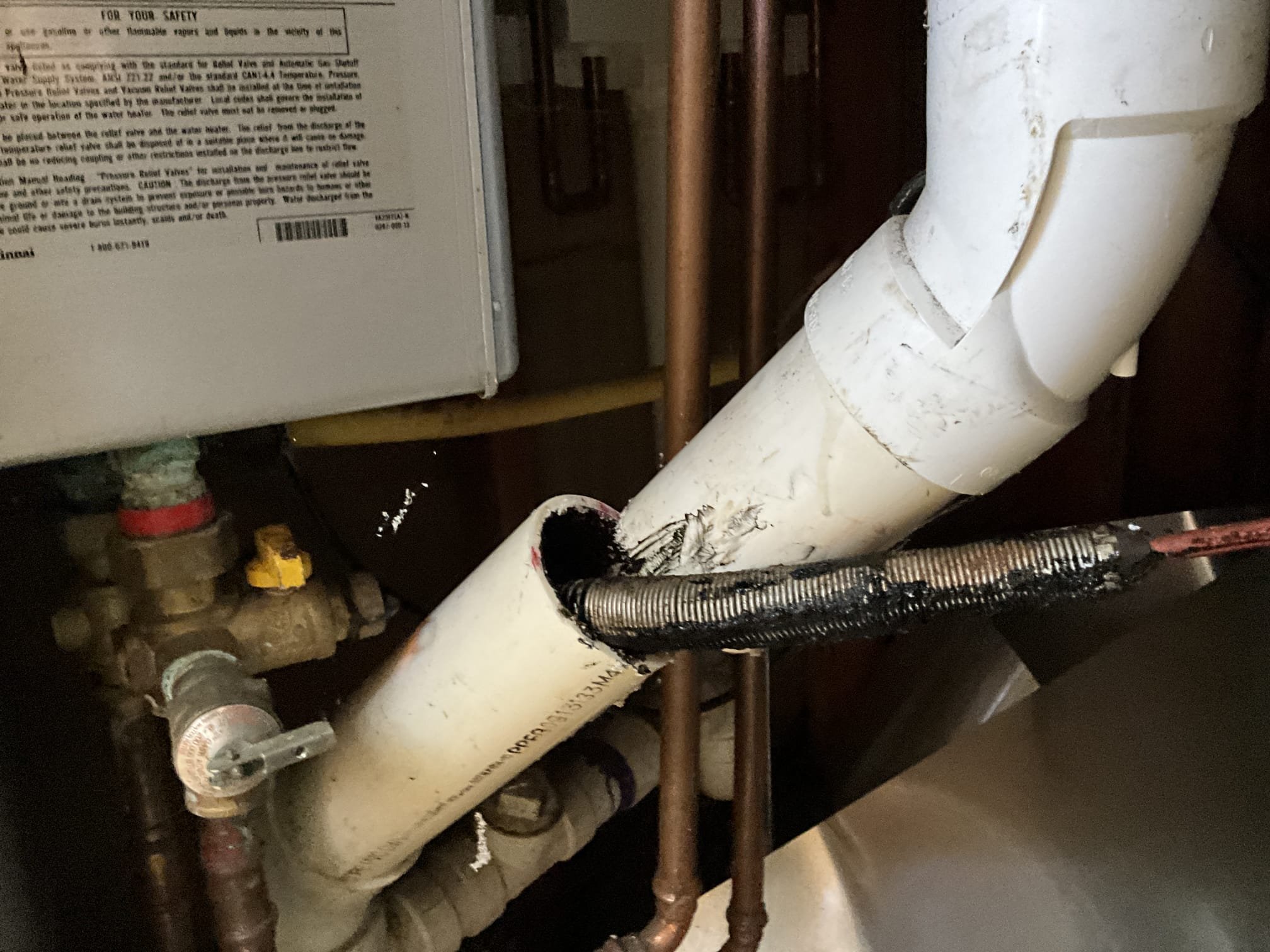 Returned and ran new pvc through the floor and connected it with a new AAV to existing temporary sink. Customer still didn’t have dimensions for the new cabinets, but simply requested to bring the new line out when the old one came out before. Drilled the penetration through the floor about 2.5-3 inches from the wall to leave room for drywall and the back of the cabinet. Abandoned the old cast vent to the roof and capped on the roof to not allow rain water to the caps below. Ran camera in pipe where it goes below the Crawlspace slab and was unable to push the camera far due to a grease blockage. Will return in the morning 9/10/25 to perform quoted work for jetting to clear the grease and perform the remaining camera work to inspect the overall health of the line. 