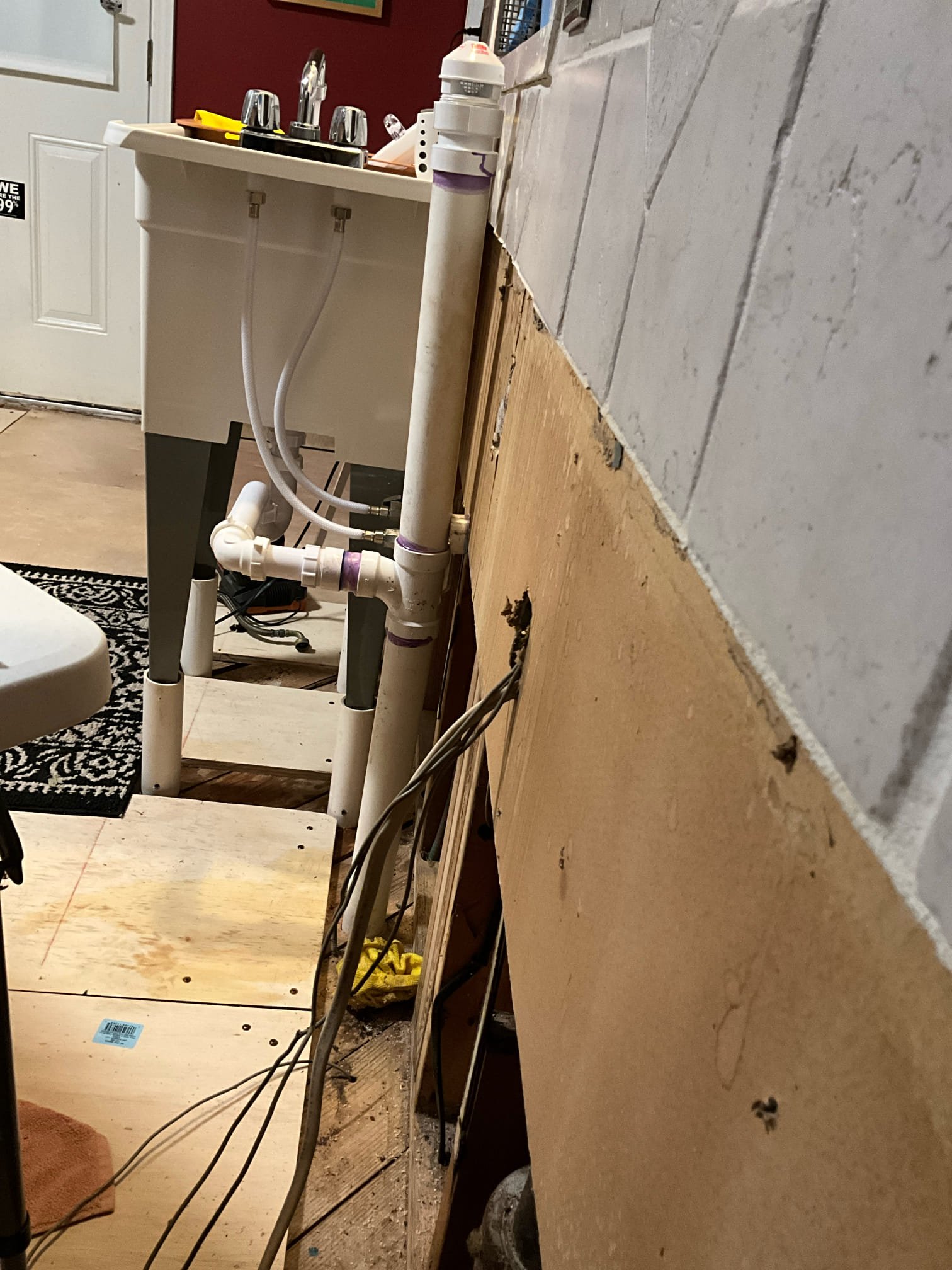 Returned and ran new pvc through the floor and connected it with a new AAV to existing temporary sink. Customer still didn’t have dimensions for the new cabinets, but simply requested to bring the new line out when the old one came out before. Drilled the penetration through the floor about 2.5-3 inches from the wall to leave room for drywall and the back of the cabinet. Abandoned the old cast vent to the roof and capped on the roof to not allow rain water to the caps below. Ran camera in pipe where it goes below the Crawlspace slab and was unable to push the camera far due to a grease blockage. Will return in the morning 9/10/25 to perform quoted work for jetting to clear the grease and perform the remaining camera work to inspect the overall health of the line. 