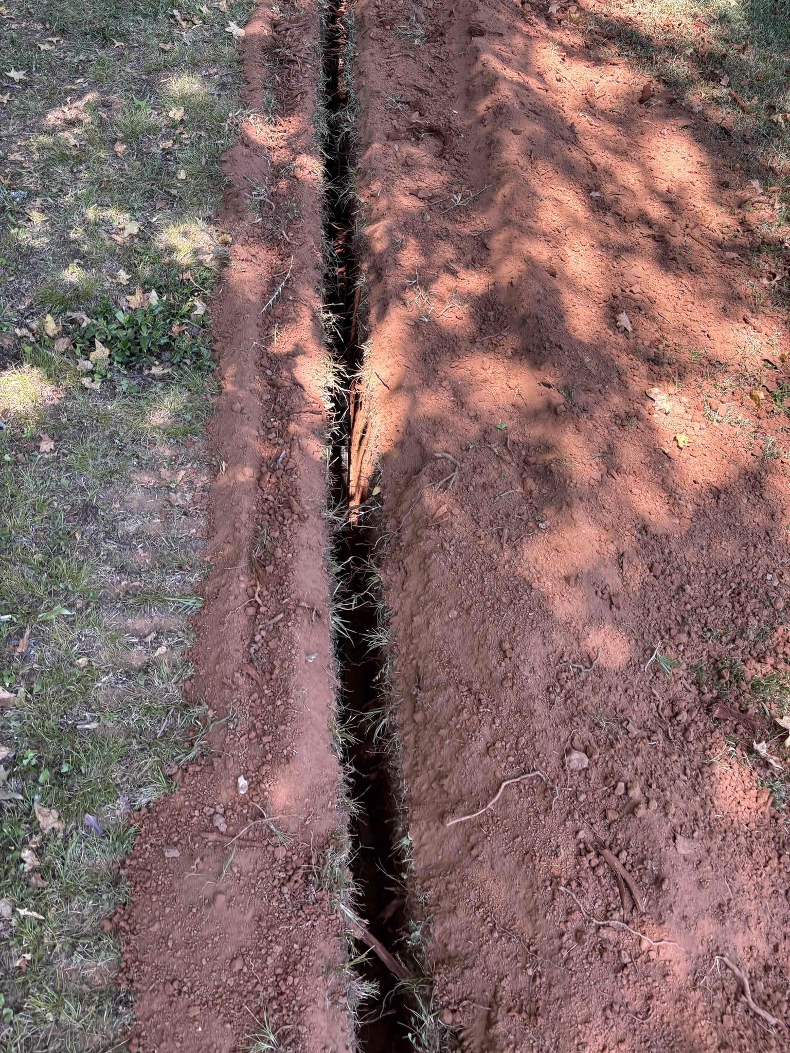 I returned today to install a new water service. Dug two holes and then I  trenched both holes together. Then I ran the new water service with a ball valve and new meter box. I tested the system and system is working properly with no issues or leaks. After I made sure there was no leaks I backfilled the holes. 