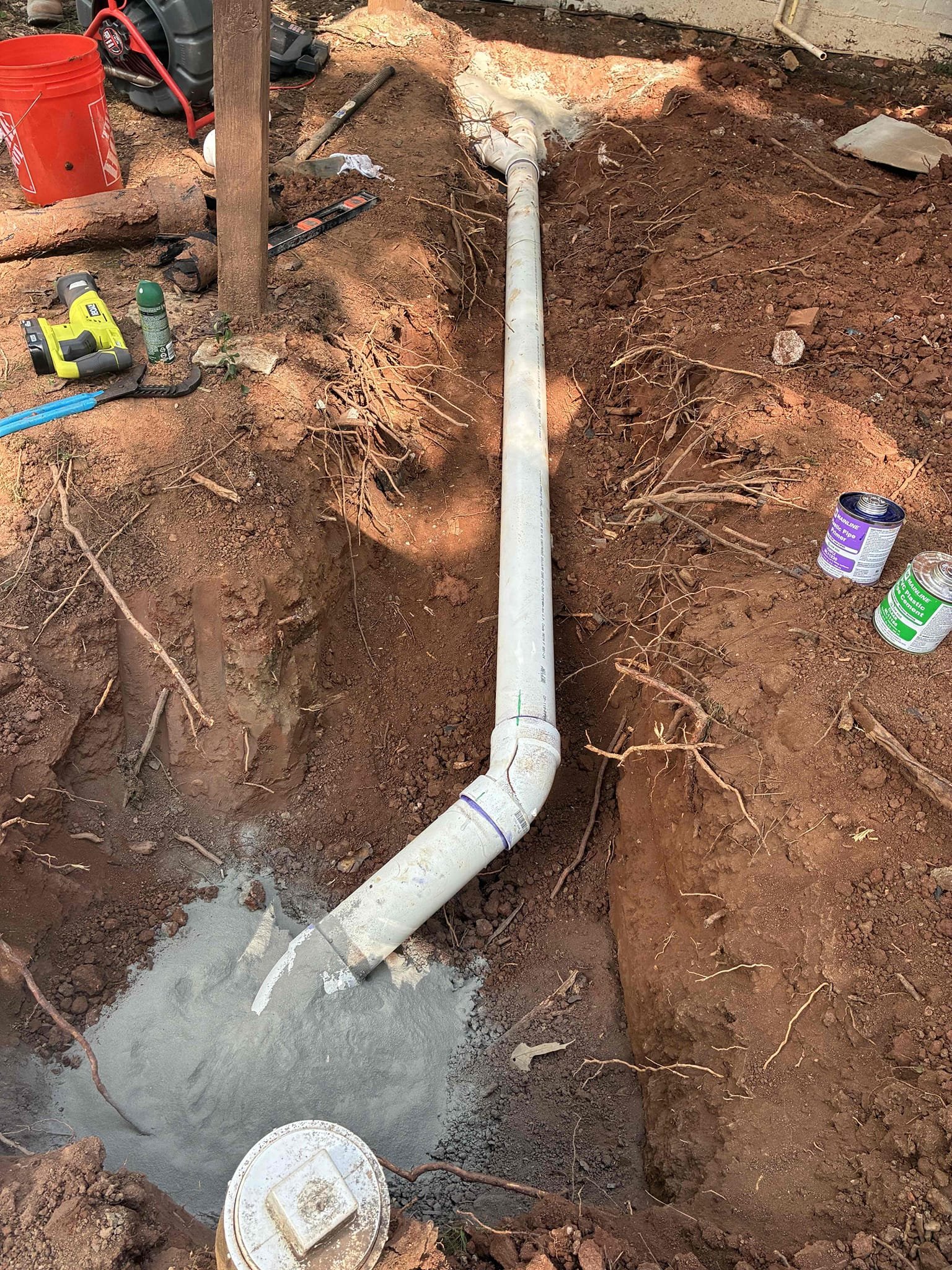 Customer had roots in 4” cast iron sewer line. Dug down with excavator and replaced 15” section with PVC back to existing clean out. After repair checked for leaks then backfilled to rough grade. Later replaced thermal expansion tank and secure to wall with bracket. Set PSI of tank to 60PSI. checks for leaks. 