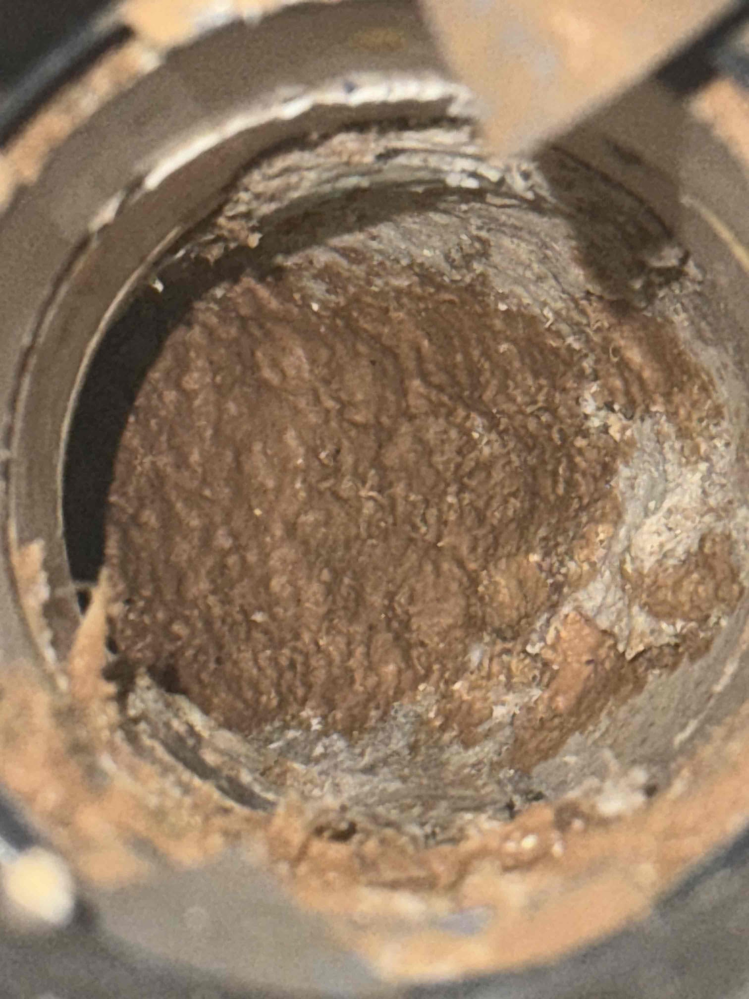 Homeowner states that their shower in the guest bathroom was remodeled a few years ago and had a relative use and it wouldn’t drain and called us to fix the issue. Upon arrival homeowner greeted me and showed me the bathroom shower and it was dry but as soon as you ran water it wouldn’t drain. Homeowner states that they attempted to clear the line but rocks and grout piece would only come up with the water. I offered different solutions and she opted to start with the simple drain cleaning without snake and I use an auger with no luck then I moved to the snake and same thing happened no luck it wouldn’t drain just feel like I was hitting something and I passed it but wouldn’t drain. Finally I replaced the p trap but still wouldn’t drain and the issue is the studor vent is below the shower pan and needs to be brought up to allow it to breath and have more room for the water to drain properly. Homeowner understands and will talk to husband after we provide a way to run the new vent upwar