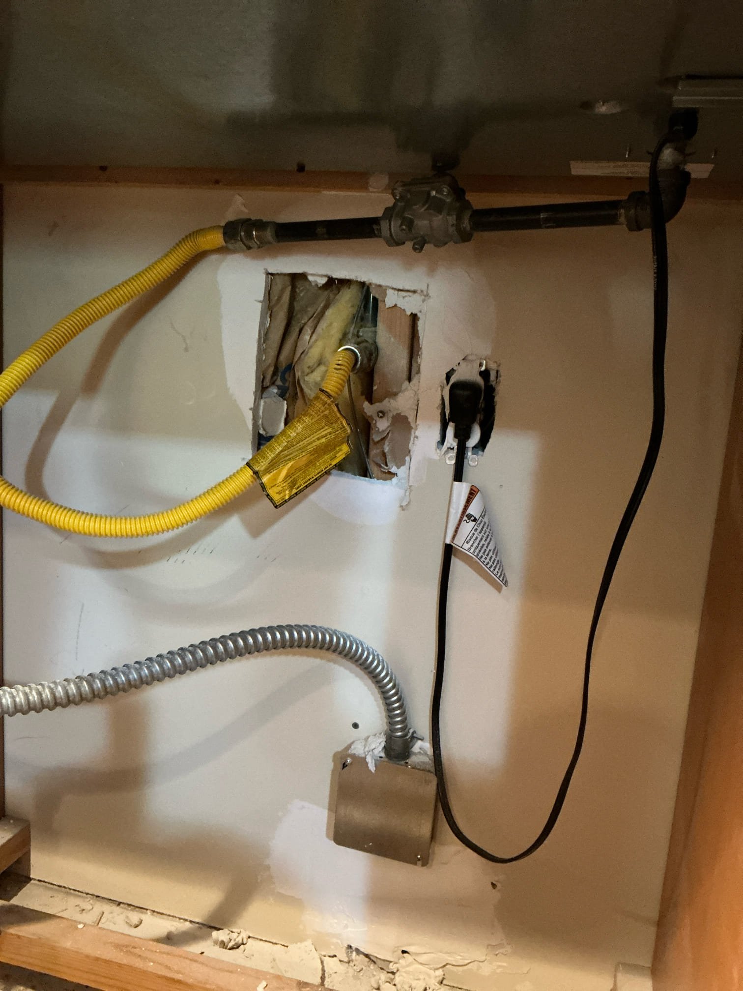 Customer had AGL out that shut off gas to apartment.  Text said that both gas fixtures in apartment were leaking. Disassembled trim plating on built-in oven. Removed carefully and accessed gas line to stove top. There is no isolation valve for the fixture. Cut drywall around fireplace key to find no isolation valve either. Installed two isolation valves for gas fixtures in home. Once valves were installed disconnected gas regulator and proceeded with gas pressure test. After 20 minutes of being pumped up to 15 psi there was no drop in pressure. Advised landlord that fireplace fixture and stove top need to be replaced or repaired for being source of gas leak.