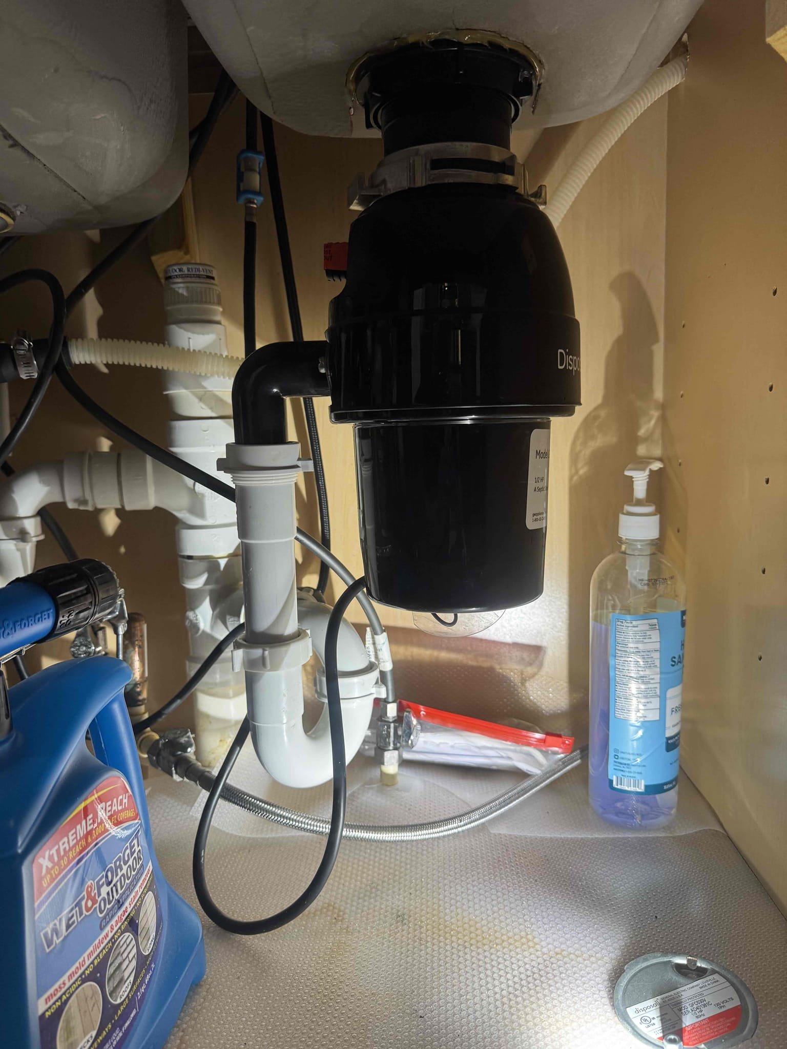 Customer garbage disposal is not working. She would like to replace it with the basket strainer. I replaced the disposal with a basket strainer and tie back into existing drain line test for leak no leak. also, I adjust the water heater temperature to 130 Fahrenheit per customer request.