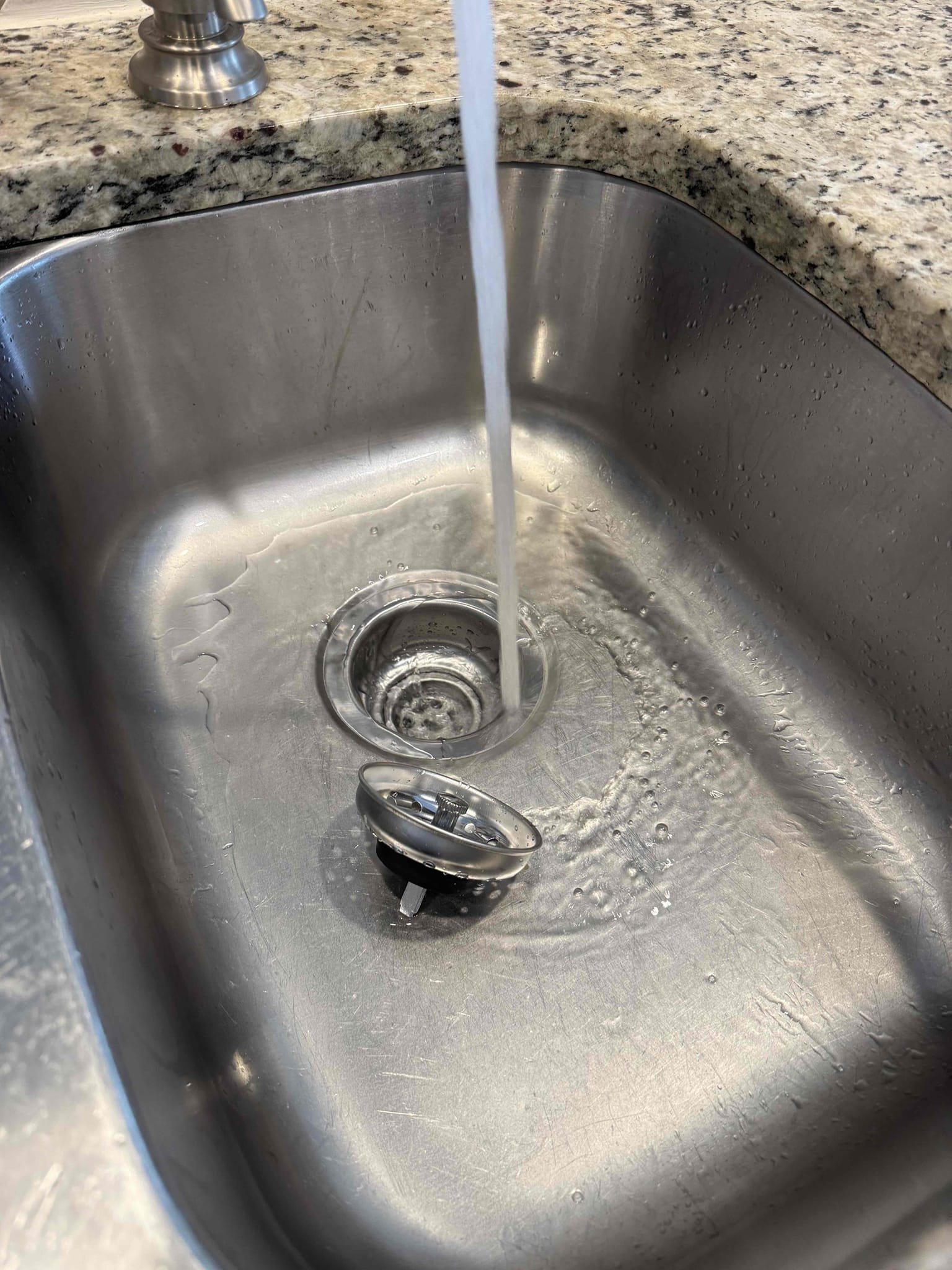Customer garbage disposal is not working. She would like to replace it with the basket strainer. I replaced the disposal with a basket strainer and tie back into existing drain line test for leak no leak. also, I adjust the water heater temperature to 130 Fahrenheit per customer request.