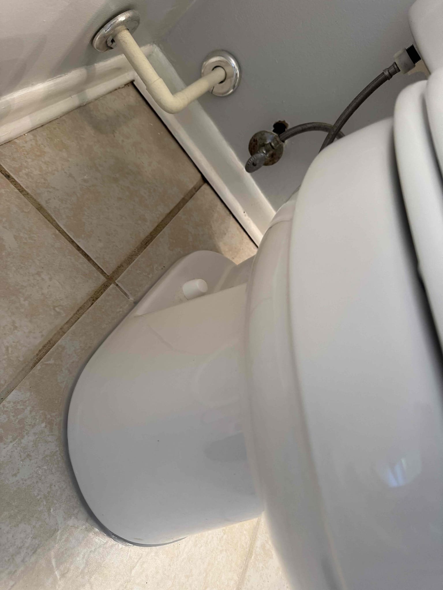 Custom branch line hallway bathroom toilet is backing u, upstair washer is tie into the same line. I pulled the toilet and ran a snake into it. Clear out the blockage at about 15 feet from the toilet after that I camera line find that there are cast iron pipe that run underneath the slab is very corroded and have a lot of scale in it. My chain knocker break up a lot of the scale, and the scale is sitting in the bottom of the pipe recommended customer to have it hydrojet and flush out also install a liner for the main sewer line that run under the slab.