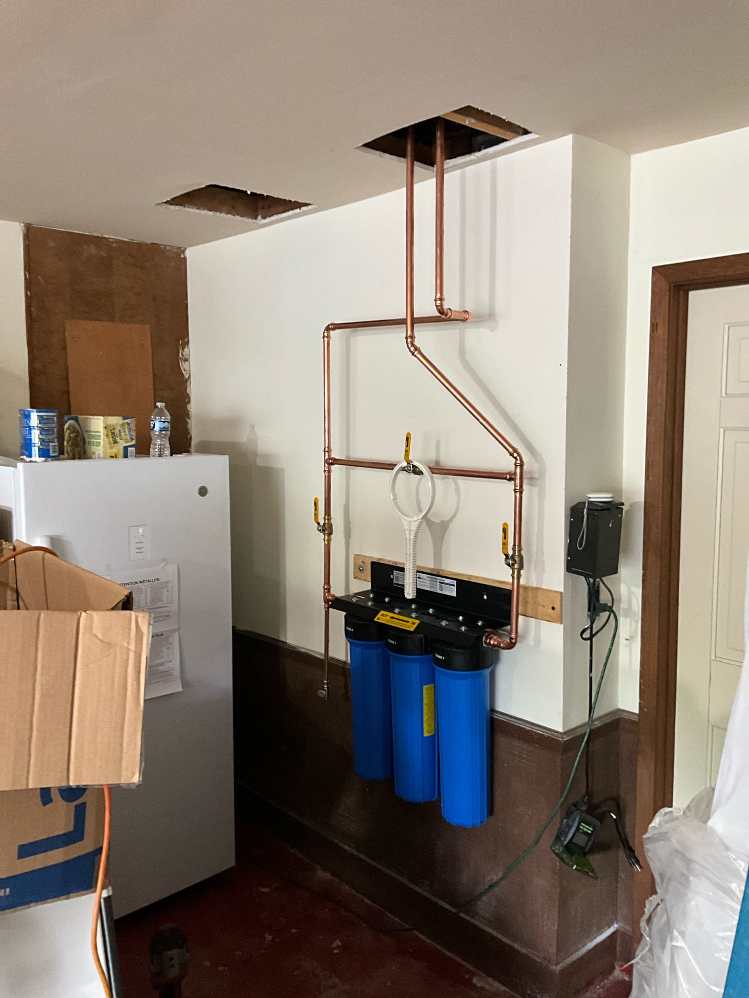 Returned and installed customer supplied whole house 3 stage filtration system. Customer inquired to having two customer supplied pop ups installed and after speaking with Dawson was informed that was to be done with the water heater. Told customer we would honor that offer for 14 more days from today.