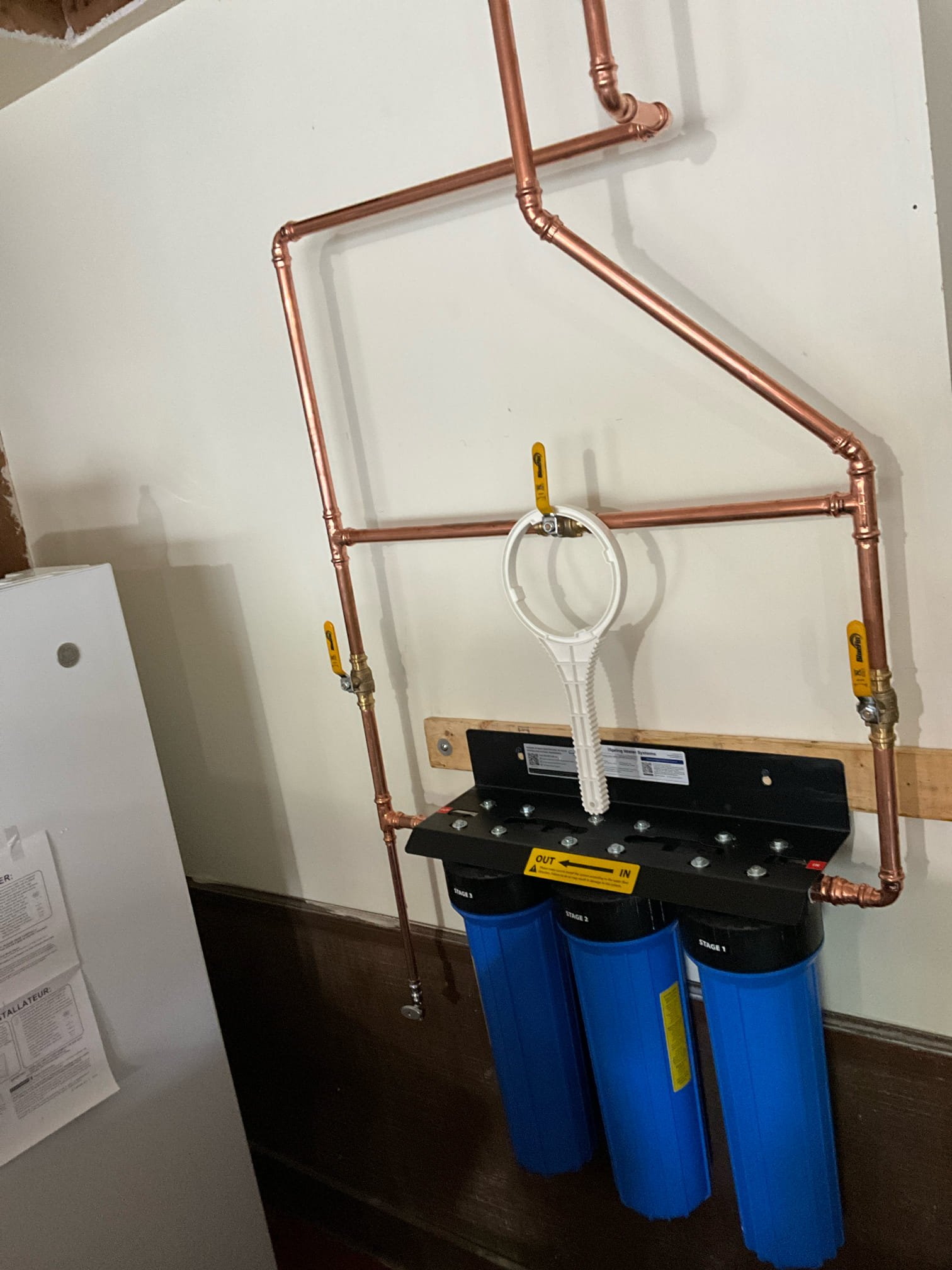 Returned and installed customer supplied whole house 3 stage filtration system. Customer inquired to having two customer supplied pop ups installed and after speaking with Dawson was informed that was to be done with the water heater. Told customer we would honor that offer for 14 more days from today.