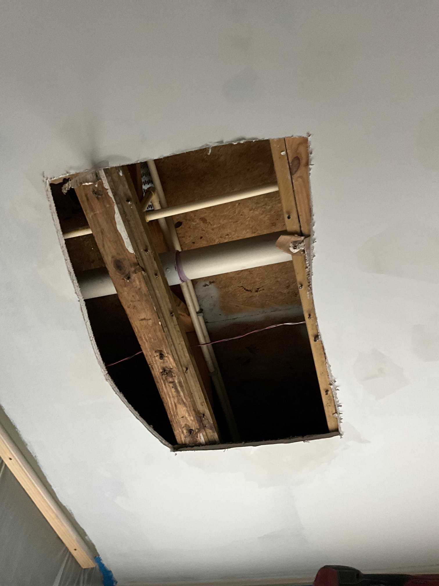 Upon arrival customer stated that there was a wet spot on the celling and the master bathroom was above that. I cut a hole in the celling and ran the shower to see if I could see where the leak was coming from. I could not get anything to leak but on further examination I found that if water got outside of the shower it started showing up in the room below. When I went to go take a picture of the water heater I found that the tankless is leaking and I informed the customer. I gave customer estimate. Customer approved estimate to replace both tankless. Before I went and picked the tankless up the customer informed me that she need to leave by 2:30. I informed the customer I would not be able to get done before then. Customer stated her husband would call the office and get it scheduled for a different day. 