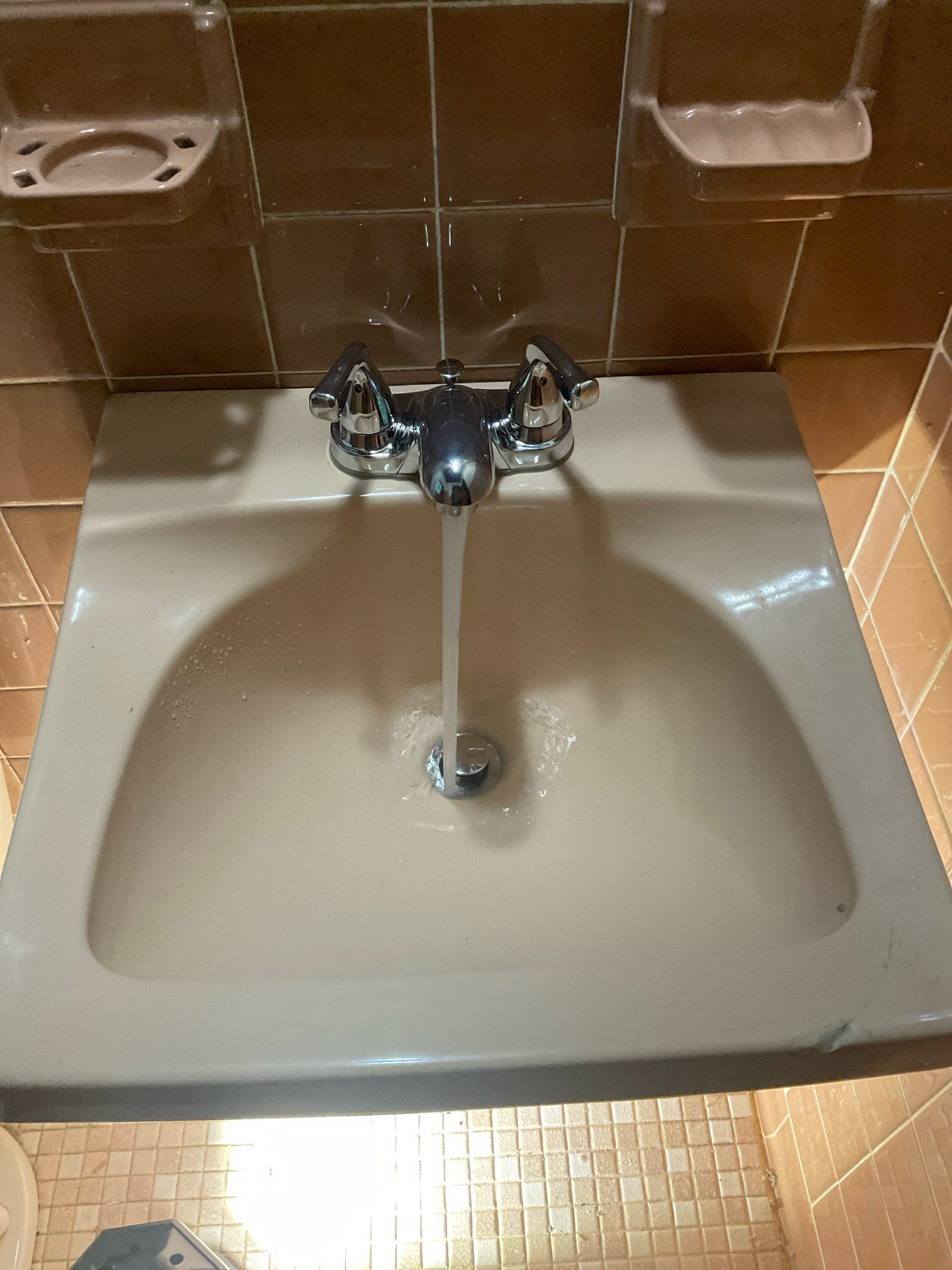 Replaced wall hung sink 4” center faucet , new chrome ptrap 