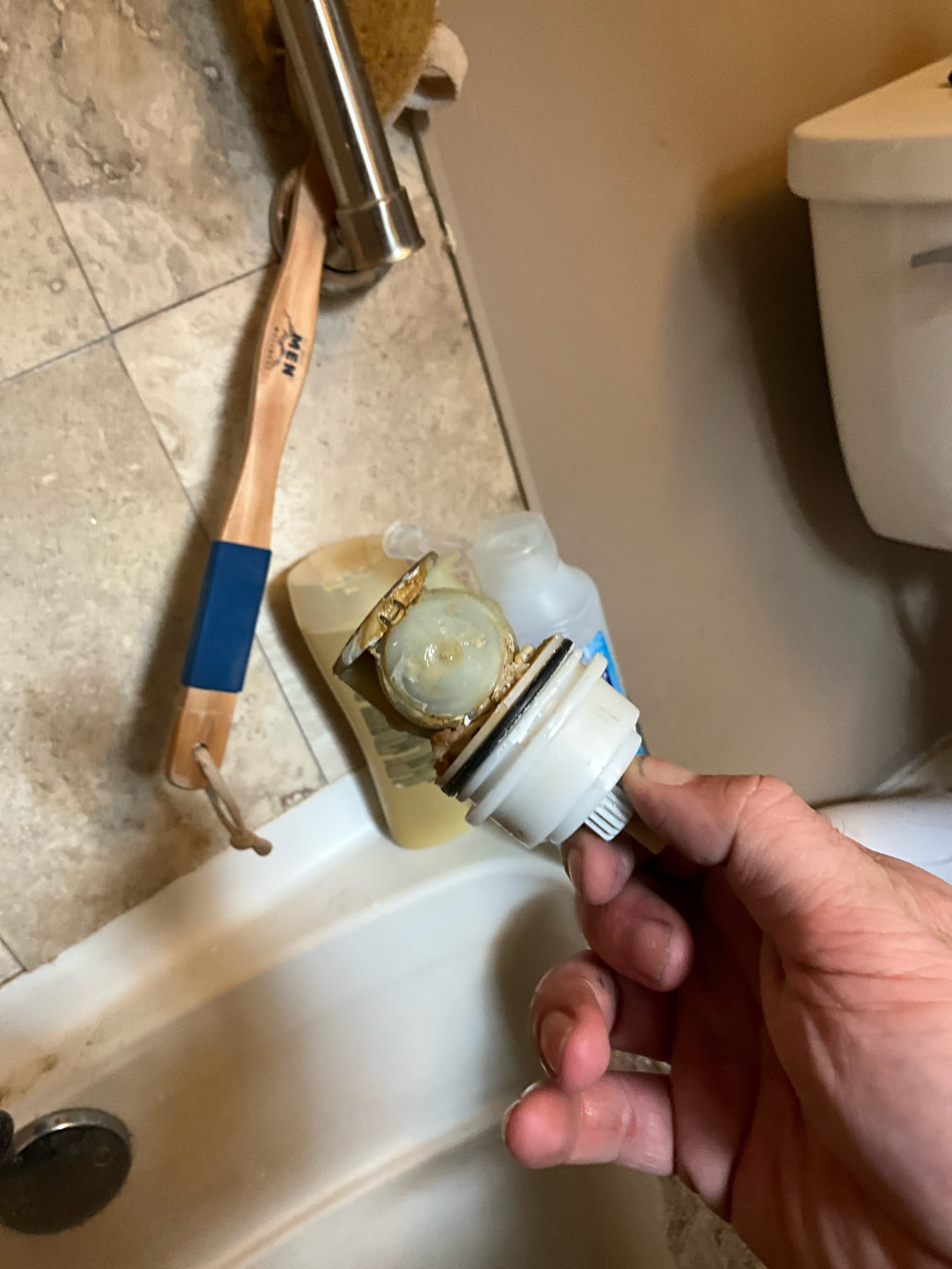 Returned and installed a new Delta monitor 17 series cartridge. Tested work to ensure proper function and no leaks. Took a time stamp of meter and found the same rate of loss. Adjusted a toilet that the fill line was close and found a hose bib left turned on leaking from the vaccum breaker. Turned the house off after repair, toilet adjustment, and turning the hose bib off. No more water is moving from the meter.