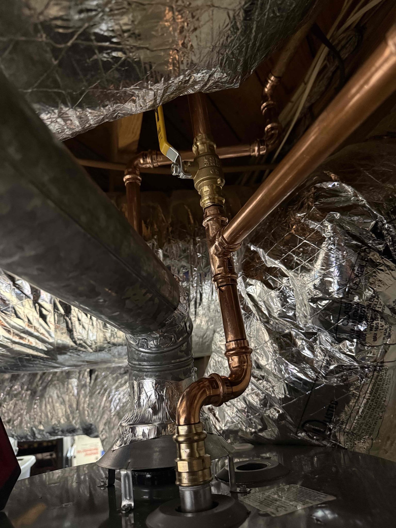 Returned to removed old GWH and install new fixtures per homeowner’s request to do the work Thursday. Upon arrival I cut off the water at meter and drained the old GWH and started to put together the new GWH. Once it was prepared I started taking the new fixtures down to the basement and removed the old GWH and PRV. I then started with the PRV and main water shut off and removed the old gate valve and PRV and pressed it on the pipe. Once the old GWH was emptied I removed it and placed a new drip pan and then the GWH and attached the vent pipe with screws and tape. I connected the cold and hot water lines with copper pipe installed a mounting bracket and the new expansion tank. I then properly connected the pipes and proceeded to the last part which was to run approximately 10 ft of new trac pipe due to the old line being copper and not up to code. I installed it and new gas shut off and checked for leaks which non were found. I then turned on the water and everything works properly no 