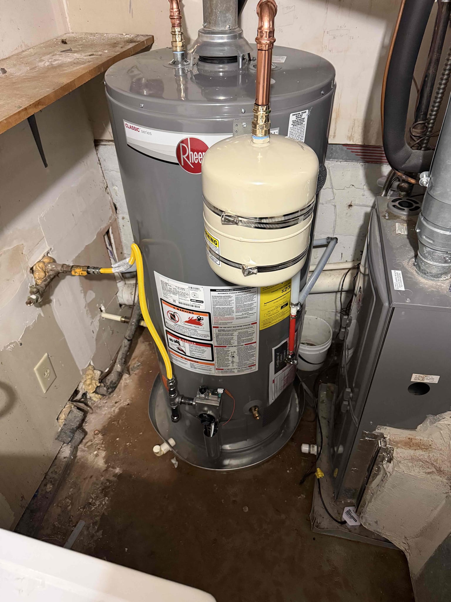 Homeowner states that her GWH is leaking and called us to come fix the issue. Upon arrival homeowner greeted me on driveway and showed me to the GWH area located behind garage. It was currently leaking and still working and informed homeowner that she needed a new unit and I offered her several different solutions. Homeowner opted to replace it with same 40 gal a new PRV and shut off and a new t&p line. I went to pick up the GWH and I removed the old one and also removed the shut off and PRV. I installed a the PRV using pex pipe and then replaced the gas shut off and installed the drip pan. I then removed the old shut off to the GWH and then installed the unit and also ran new pex pipe for the discharge line. I connected the new unit to the hot and cold lines and installed a mounting bracket for the expansion tank and connected all together. Once it was all pressed I turned on the water and it works properly no leaks or issues and homeowner is satisfied with the service provided also i Homeowner states that her GWH is leaking and called us to come fix the issue. Upon arrival homeowner greeted me on driveway and showed me to the GWH area located behind garage. It was currently leaking and still working and informed homeowner that she needed a new unit and I offered her several different solutions. Homeowner opted to replace it with same 40 gal a new PRV and shut off and a new t&p line. I went to pick up the GWH and I removed the old one and also removed the shut off and PRV. I installed a the PRV using pex pipe and then replaced the gas shut off and installed the drip pan. I then removed the old shut off to the GWH and then installed the unit and also ran new pex pipe for the discharge line. I connected the new unit to the hot and cold lines and installed a mounting bracket for the expansion tank and connected all together. Once it was all pressed I turned on the water and it works properly no leaks or issues and homeowner is satisfied with the service provided also i