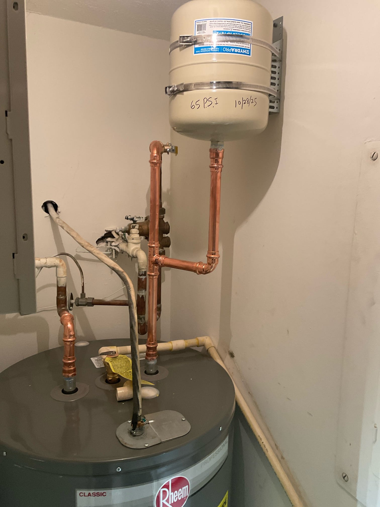 Replaced a 50 gal electric water heater , pan ,expansion tank with bracket  Replaced a 50 gal electric water heater , pan ,expansion tank with bracket