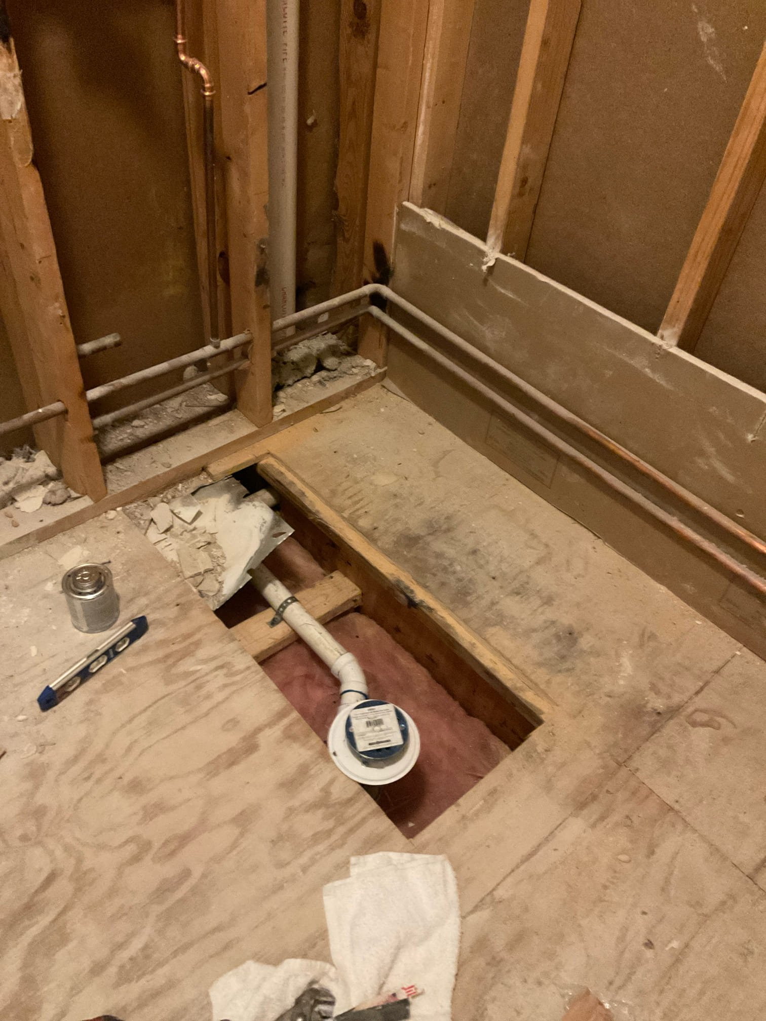 Convert tub drain for tile shower , cut subfloor open to move the drain     Convert tub drain for tile shower , cut subfloor open to move the drain