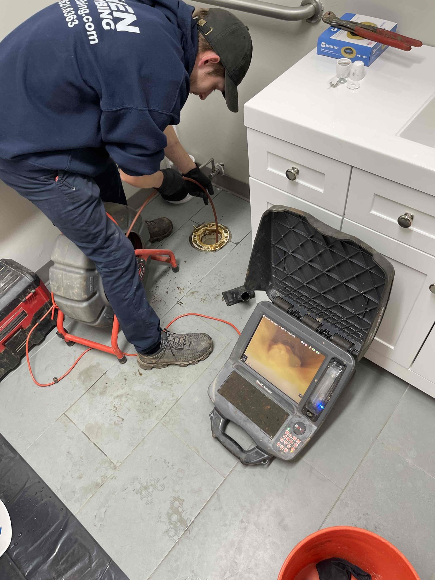 Was not a recall. Customer has ongoing drain issue resulting from concrete falling into the drain and hardening. We left quote previously to correct this issue.  Back up was identical to previous service. Soft tissue blockage that occurred at the point in the line where the concrete is built up inside the pipe. Issue will continue to happen as long as the bathrooms are used and the repair work is not done to remove the concrete from the drain line. 