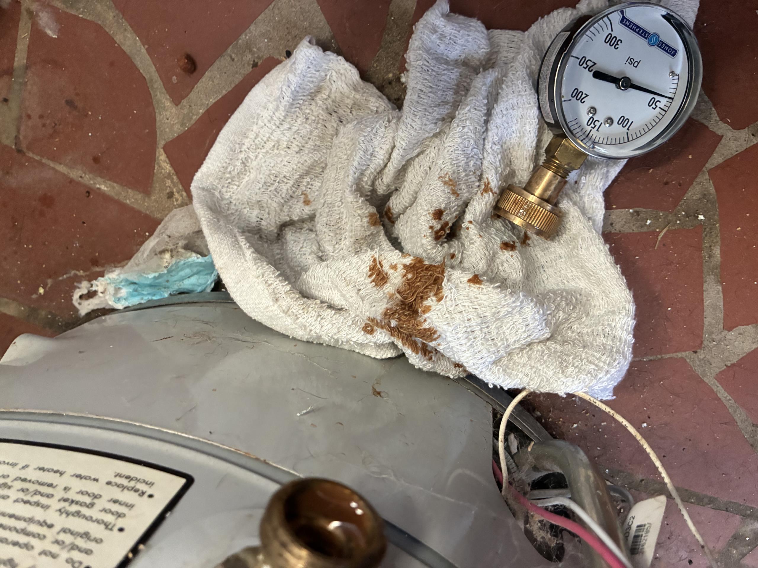 Call for gas leak.

Arrived and spoke with Christopher about concerns. He stated 5at his neighbor said they smelled gas outside of the house, so Christopher called Atlanta gas light to check his gas. AGL checked his gas and stated he may have a leak near the water heater. Upon checking I found the flexible gas line was not tightened all the way. 

While inspecting for problem I also found that the water pressure was extremely high, and very dark rust colored water came out of the water heater when I checked pressure. Thermal expansion tank bladder has also ruptured. I recommended replacing the pressure regulating valve immediately. Christopher stated he would like an estimate provided for the work. I discussed finance options available if needed.