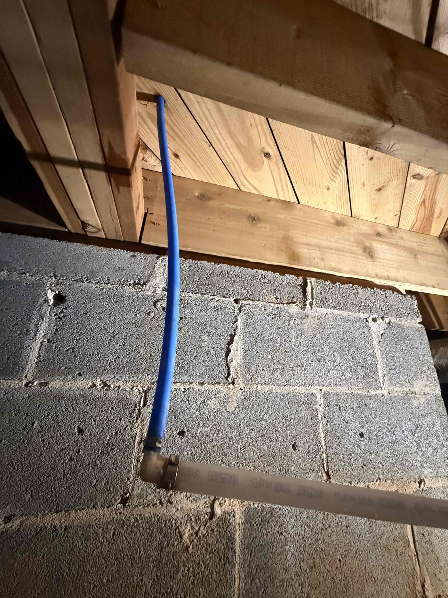 Homeowners state that they had family over and they used the water on the fridge door and it leaked over night and didn’t have a way to shut it off so they called us to fix the issue. Upon arrival I was greeted by homeowner at door where they showed me to the fridge and I could see that the line was ran from the basement/crawl space without a shut off. I offered a couple of solutions and homeowner opted to just fix it and add a shut off behind the fridge. I began by cutting off the main water and drilled the same hole bigger to then drop in 1/2 pex pipe and used an ice maker angle stop on top. Proceed to crawl space and removed the saddle valve and added a 3/4 tee and then a pex adapter and ran pex pipe over to where I previously stick down the other pipe. I connected them properly and then pressed together the copper pipe and then turned the water back on. No leaks or issues were found and the new angle stop works properly and homeowners are satisfied with the service provided. 