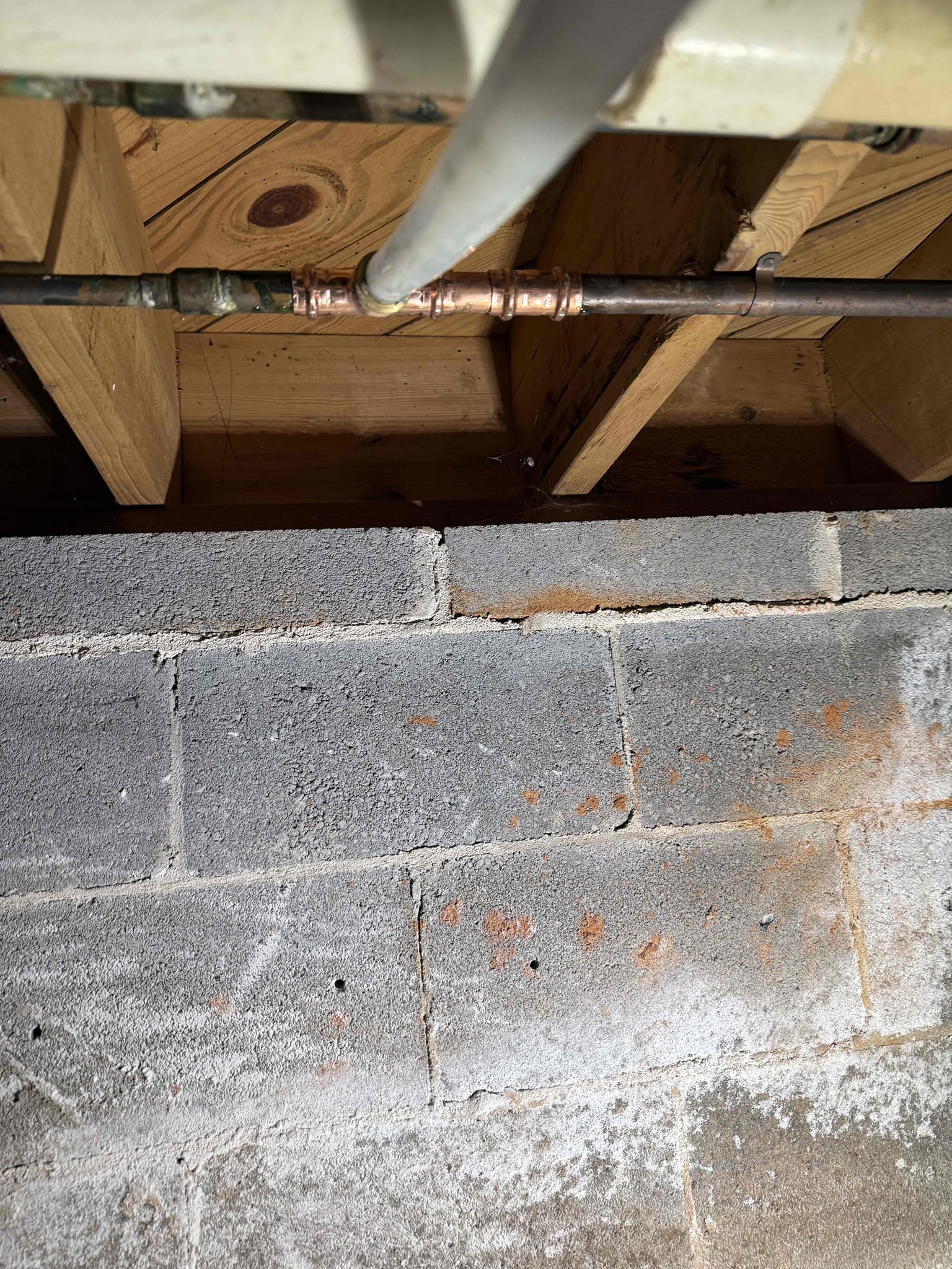 Homeowners state that they had family over and they used the water on the fridge door and it leaked over night and didn’t have a way to shut it off so they called us to fix the issue. Upon arrival I was greeted by homeowner at door where they showed me to the fridge and I could see that the line was ran from the basement/crawl space without a shut off. I offered a couple of solutions and homeowner opted to just fix it and add a shut off behind the fridge. I began by cutting off the main water and drilled the same hole bigger to then drop in 1/2 pex pipe and used an ice maker angle stop on top. Proceed to crawl space and removed the saddle valve and added a 3/4 tee and then a pex adapter and ran pex pipe over to where I previously stick down the other pipe. I connected them properly and then pressed together the copper pipe and then turned the water back on. No leaks or issues were found and the new angle stop works properly and homeowners are satisfied with the service provided. 