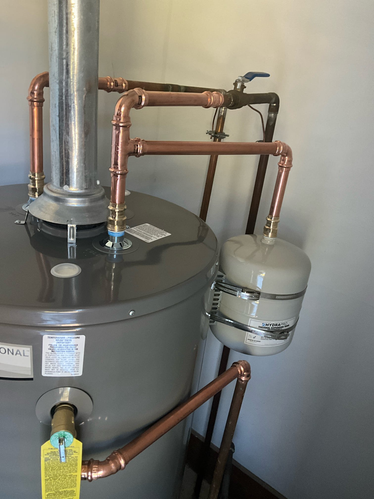 Returned and installed a new 40 gas short water heater. Left the existing ball valve, installed new drip pan, and thermal expansion tank. Replaced section of venting. Tested all work to ensure proper function and no leaks.