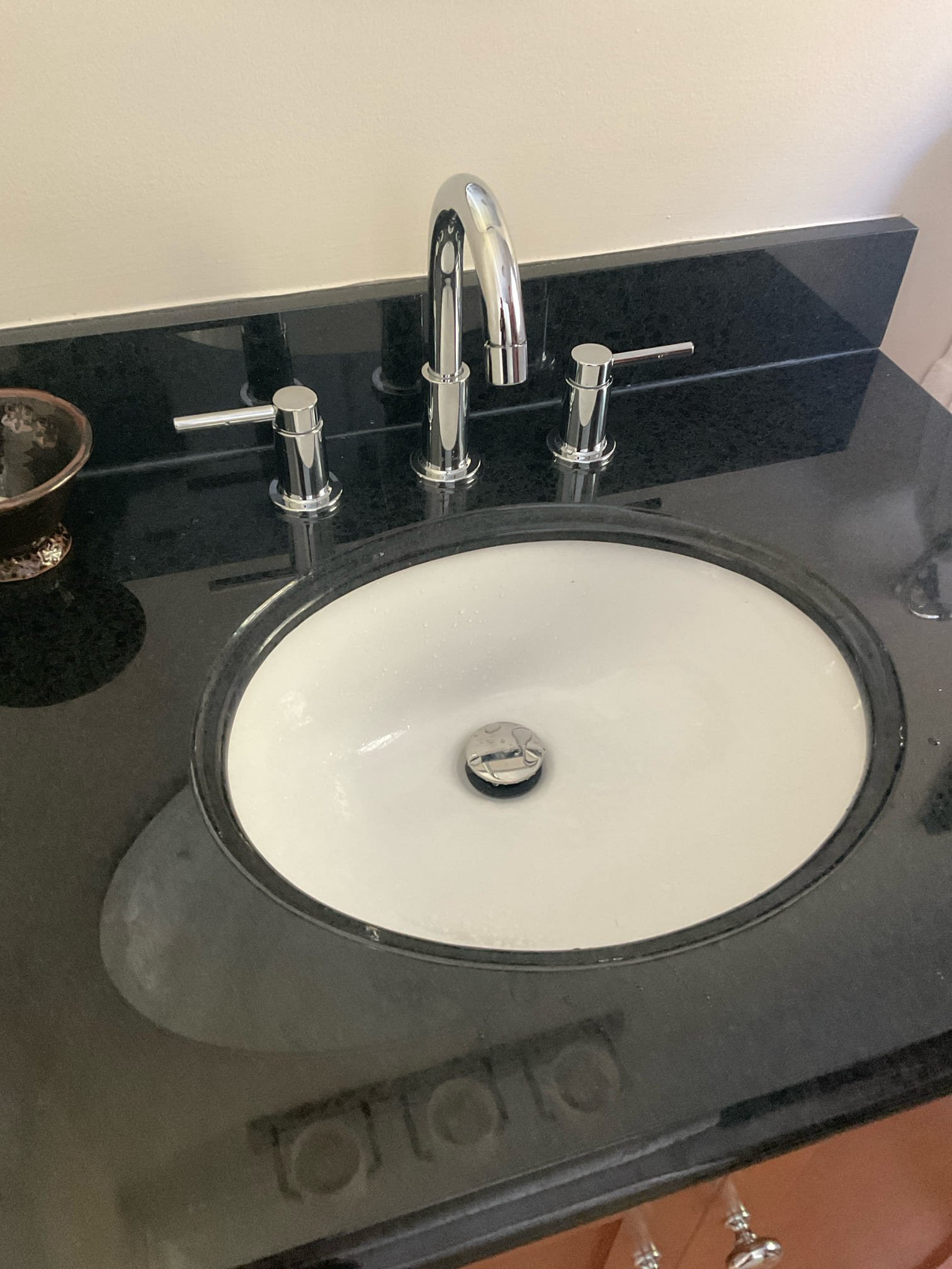 Faucet that I repaired by replacing cold cartridge found leak underneath handle. Recommended to customer to have faucet replaced. Customer agrees, I went ahead and installed faucet that we purchased from Home Depot. Tested and no leaks were presented at this time. Also credited back previous work.
