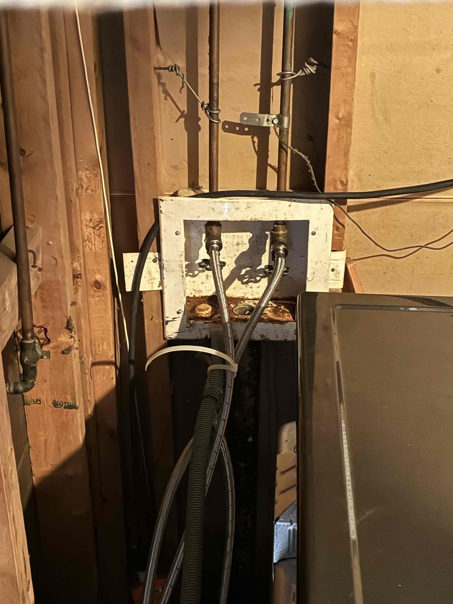 Customers washing machine drain needs to be replaced due to machine pulling back dirt. Will set up to return tomorrow to continue full work. Returned the following day to cut out concrete (3’x3’) in order to redirect line. Found line from ptrap to be broken due to aging and abandoned line in slab, reroute washing machine box to stack next to back door. Repaired small section in bathroom floor which was full of grease, which indicated line was full of grease back to stack next to back door. Cut out section of stack and included new 3” test tee and tie in to washing machine box. Used jetting equipment to jet line all the way to the tie in to the main to remove grease from line. After jetting, ran camera to check quality of jetting work but later found pipe partial collapse right where line ties into main line. Customer has functioning system as of now but will need to further address the piping collapse in line. Put back dirt in bathroom but have not put back concrete due to further work