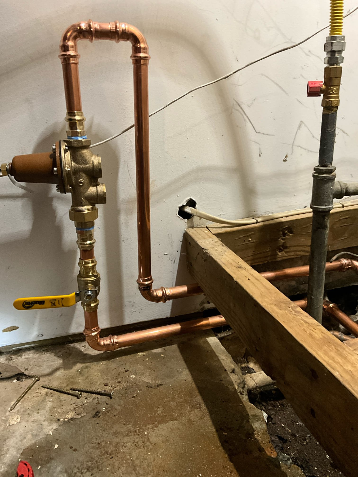 Call for leak at water heater. 

Arrived and spoke with Scott. Inspected water heater and found unit was ruptured from interior tank. Pressure was incredibly high, ~140psi at 4pm. Prv was located in a very difficult to reach position under the water heater. 


Install new 50 gallon gas water heater. This includes the additional installation of a shut off valve valve, thermal expansion tank and mounting bracket, and vent correction.  A drain pan will be added in and discharge to existing low point in garage. 

Pressure regulating valve installed valve will be replaced, and relocated to be accessible for inspection and future repairs. This included more time and material than normally required for a prv replacement.

Shut off valve is labeled for quick access. Unit is lit. I discussed all work with Scott and ensured he is happy with all work completed.