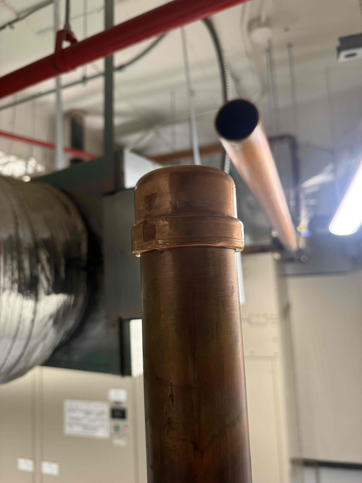 Customer states that they needed to copper lines capped with propress fittings today and called us to come out and do the work. Upon arrival customer meet me in the loading dock area and took me to the mechanical room of the 8th floor where the two lines are located. After inspection I offered the solution he was looking for and agreed to cap the two lines. Had go to the shop and pick up the big propress and fittings then I returned to the loading dock and waited for them to come and let me in the building. I cut out two sections on the first pipe prepped it and then pressed the cap on and same thing on the other pipe. After capping them they tested the caps by running water and they work properly no leaks or issues and customer is satisfied with the service provided. 