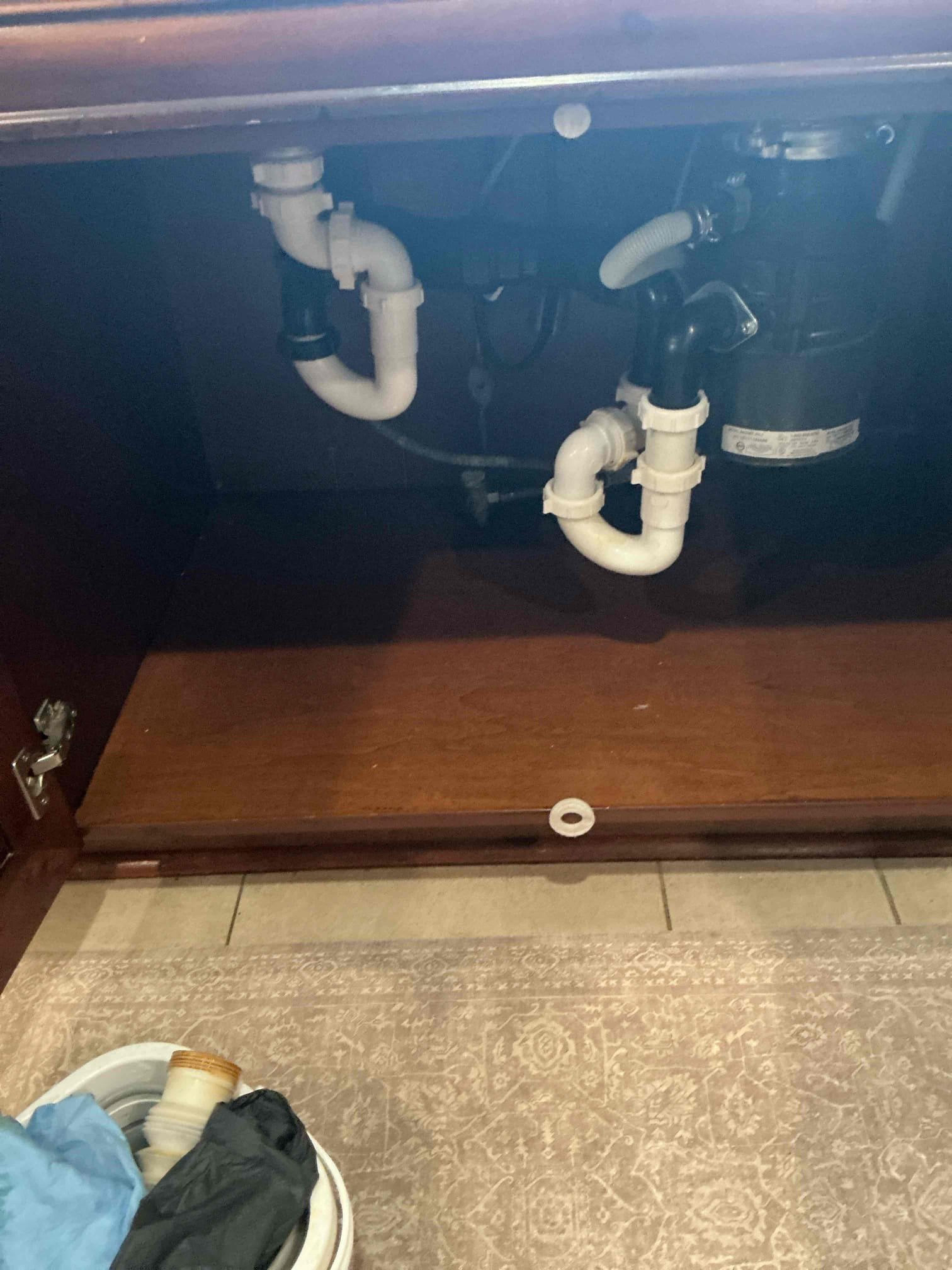 Removed old leaking accordion style P-trap that was currently leaking, reworked and used tubular P-trap, there are multiple code violations underneath the sink, Customer understand this is a temporary repair.