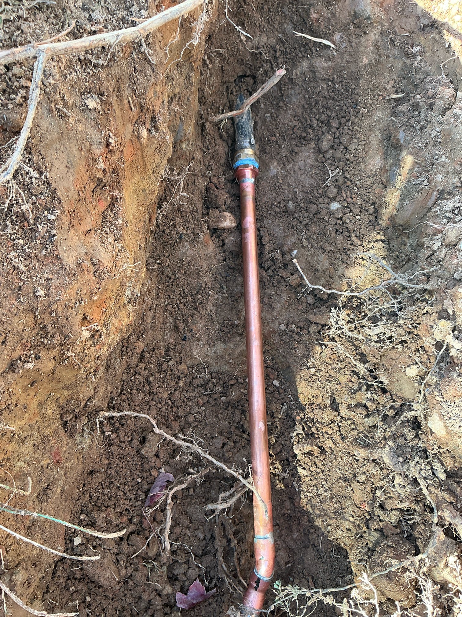 Client called us out today due to a main water service line leak out in the yard just after the water meter about 2’ under ground. We had made a repair in similar area 3 years ago. Client decided he did not want pex for the repair and wanted sweated copper and fittings. So we installed new meter nipple with new watts dual check valve, then ran 3/4” copper about 5’ and tied into the existing 1” black poly main running to home. Turned water back on and tested. No more leaks. Backfilled as best we could to grade after testing. 

1 yr warranty on repair. 

Charged card on file and emailed invoice and pictures per request. 