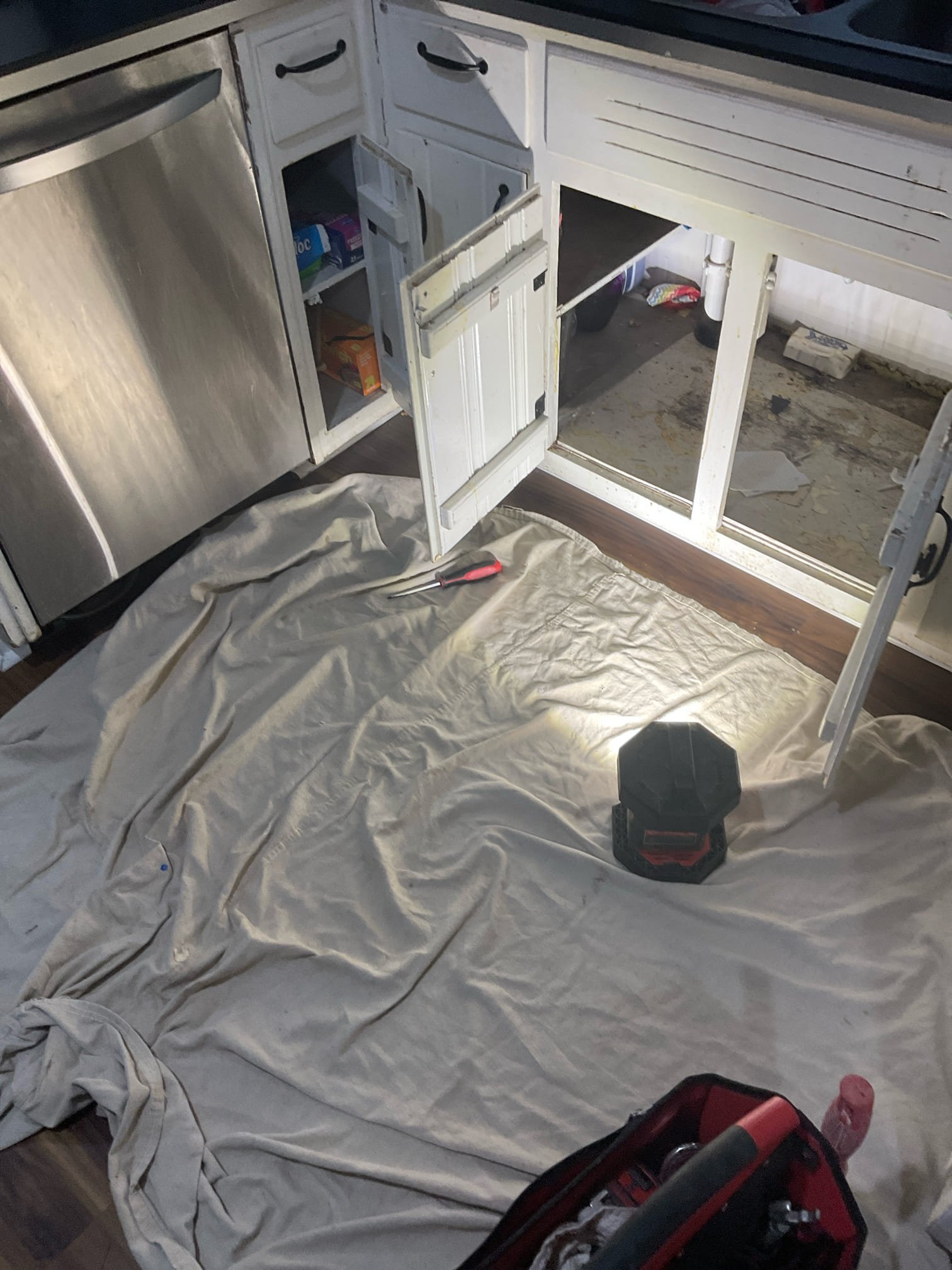 Cap off dishwasher plumbing in crawl space , relocate water and drain to under the kitchen sink , remove old dishwasher and installed new dishwasher 