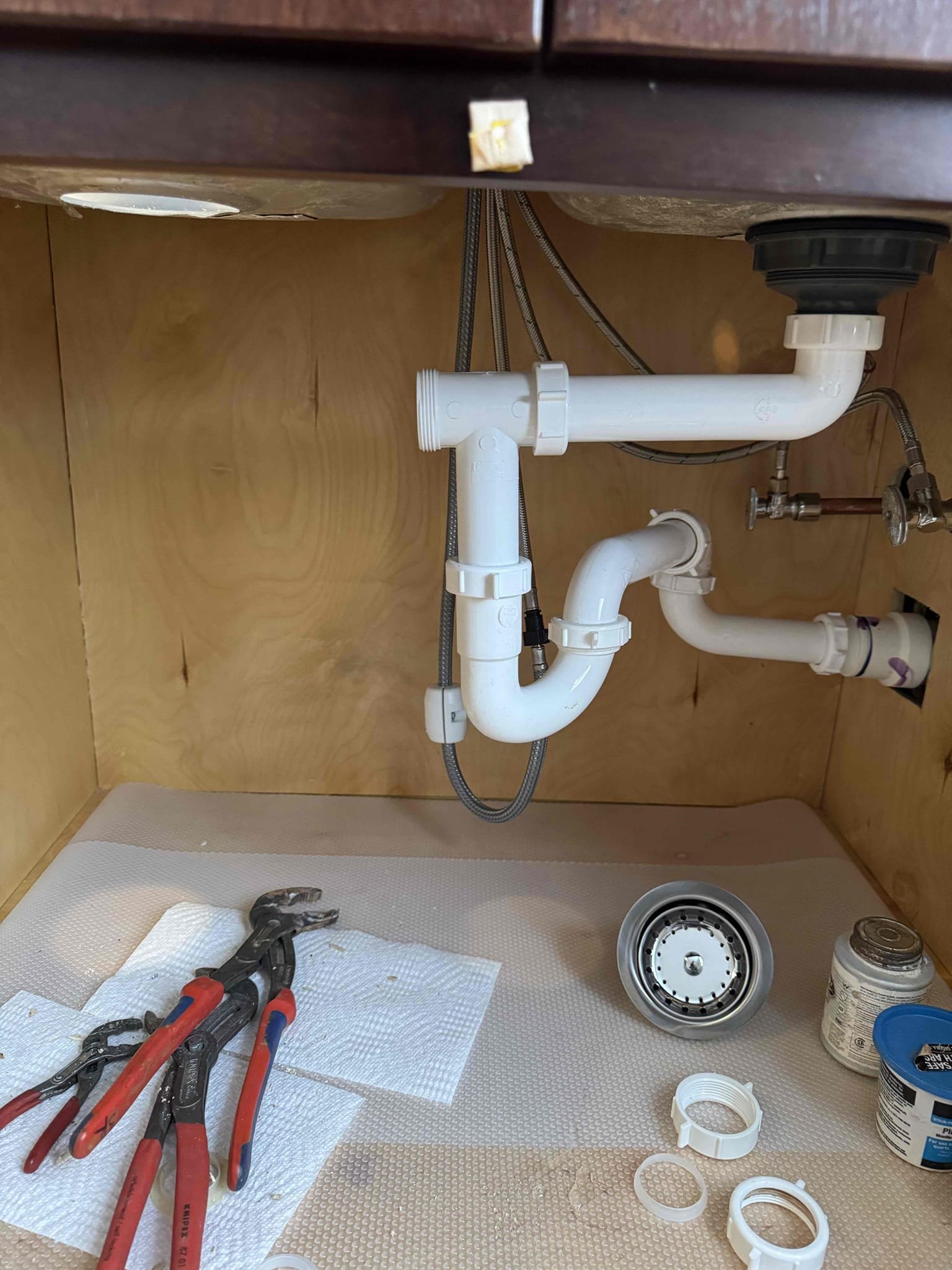 Upstairs removed two toilets and hauled away. Installed customer supplied toilets and tested. No leaks were present at this time so caulked around bases of toilets. Downstairs kitchen sink there was a leak on basket strainer, so went ahead and replaced basket strainer and tested. No leaks were present. Repaired hose bib in front of the home and tested. No leaks, surprised at this time, but there is no warranty on hose bib repair. Also no warranty on customer supplied parts. Cleaned up work area.