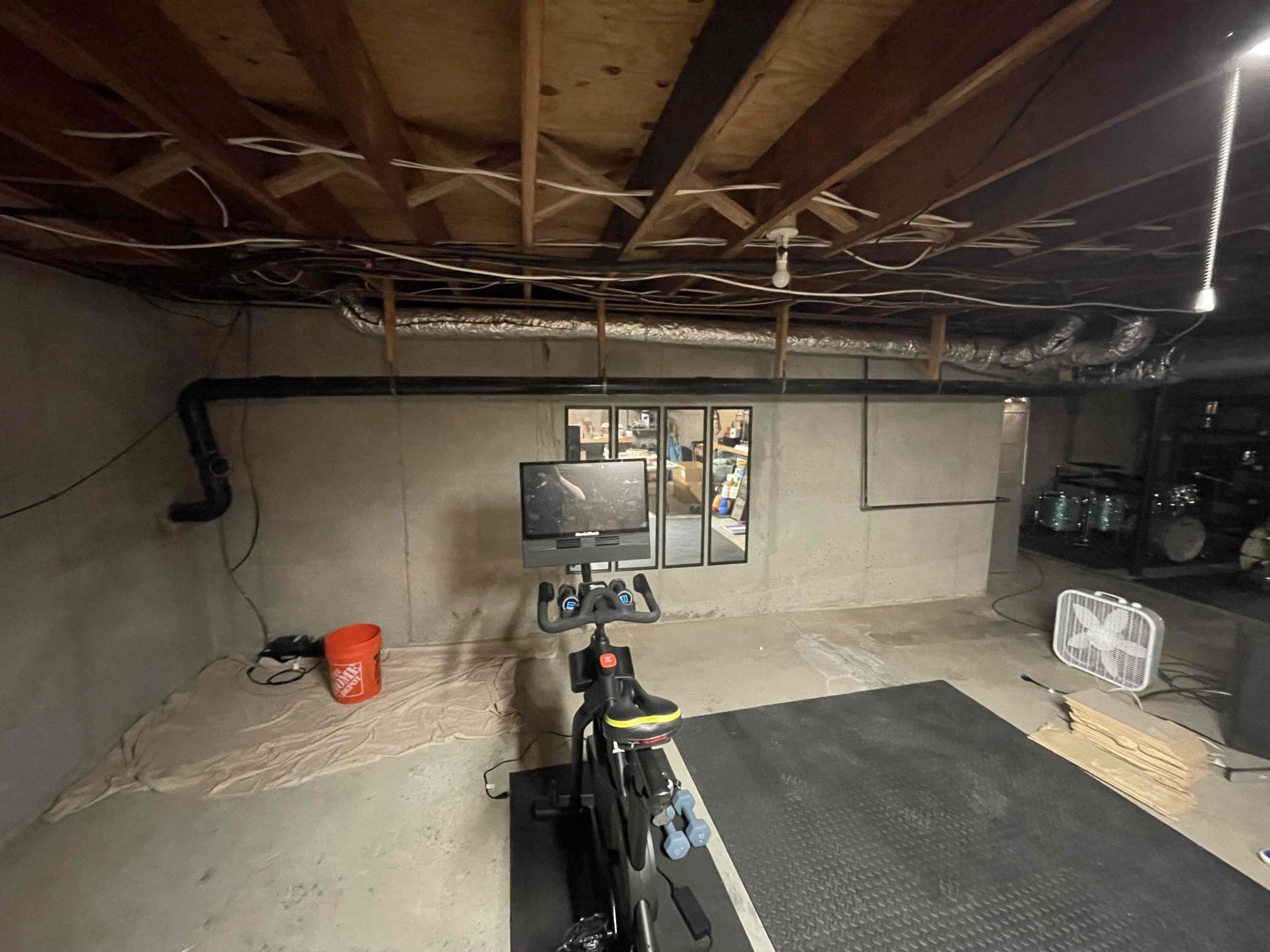 Came out to perform work as quoted. Cut out 30’ drain piping inside the basement. Dug up the first 15’ of drain piping outside. We found there was a cleanout installed that was original to the home. Where 5e cap was coming up to the ground level, there was a slab of concrete poured over it for the hvac condensor. Weight of the concrete pushed down on the pipe over 5e years and cracked the abs and caused a belly under the condensor slab. We replaced pipe coming back through the wall. Installed new two way cleanout by the foundation wall. Backfilled and bedded pipe. Sealed foundation with hydraulic cement. Tested to ensure a leak free installation. No further issue at this time. 2 year warranty on replaced section only. Warranty does not include soft tissue blockages due to flushing too much paper. 