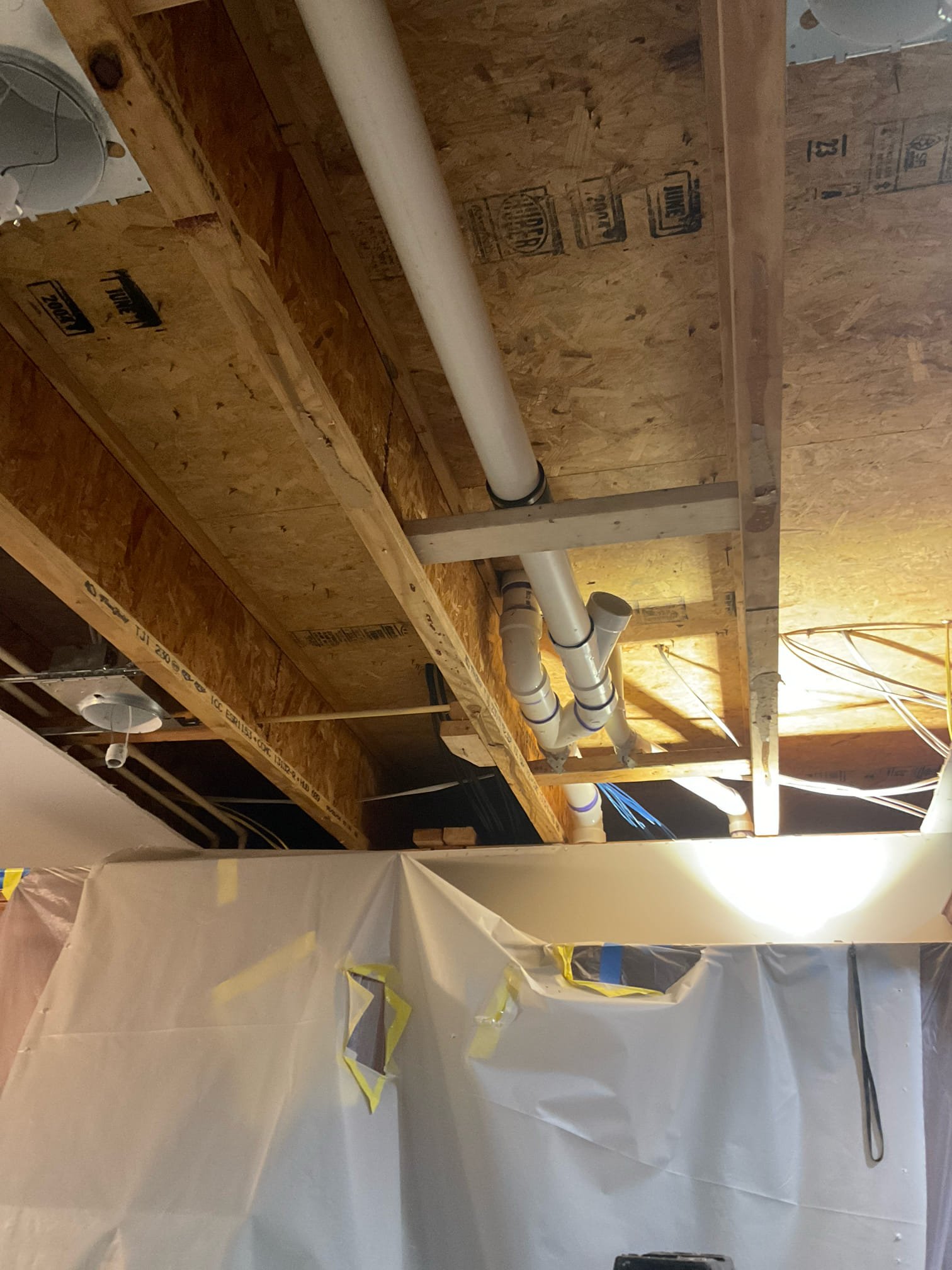 Customer had multiple back up to master bathroom caused toilet overflow , tub and shower not draining, we corrected some slope of the pvc pipe and used hydro jetting equipment cleaned line from bathroom down to basement to outside , this line is also connected to kitchen sink drain , also found grease build up in pvc pipe in basement area by water heater / furnace area 