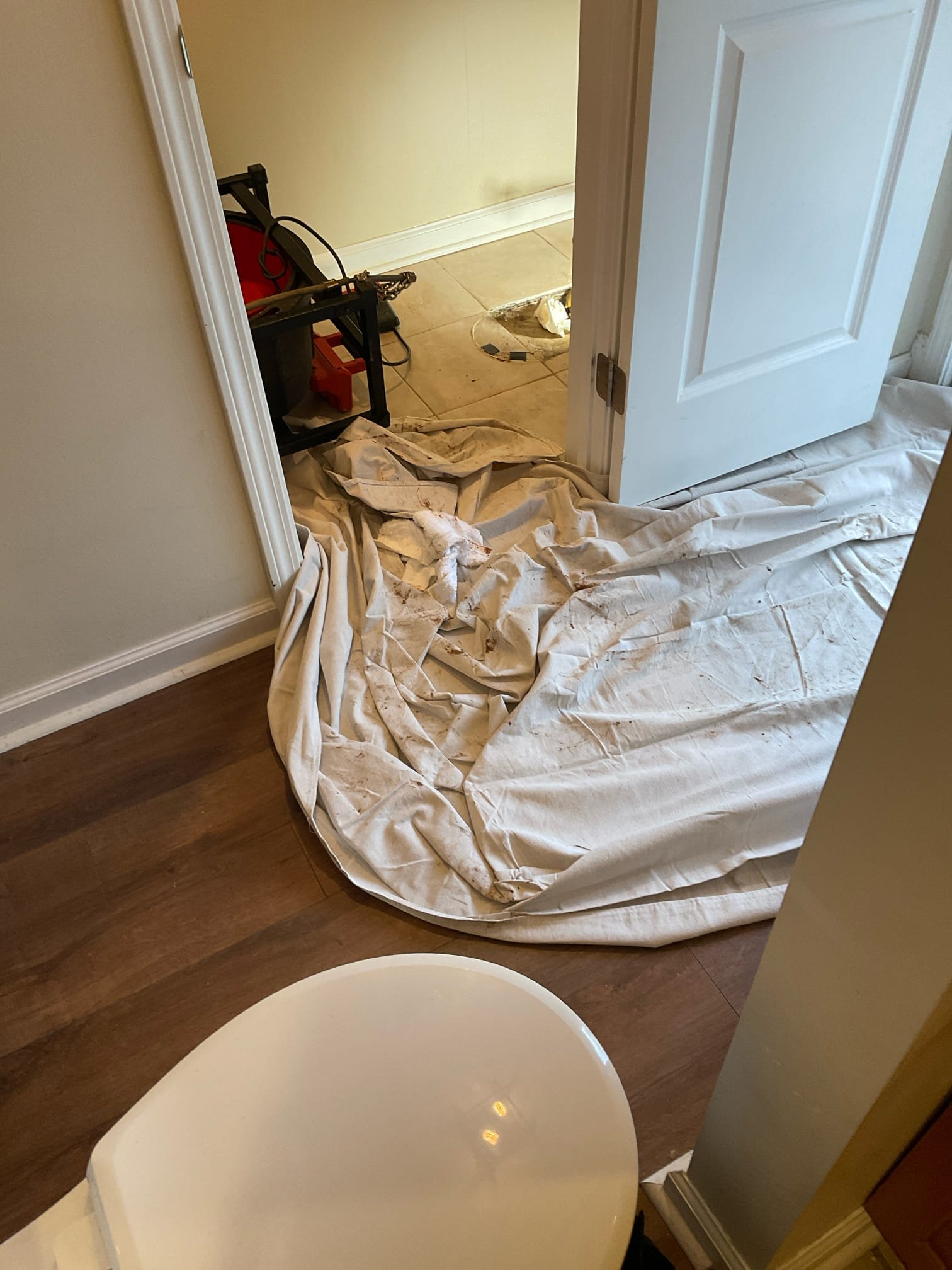 Customer called for toilet is filling up sometimes, we removed toilet checked found blockage in main line under the slab , we cleared blockage with chain snake , did camera inspection found old cast iron pipe with build up not good slope , some area had negative slope , reset toilet , recommend customer for jetting cleaning, customer want wait till next time because of the cost 