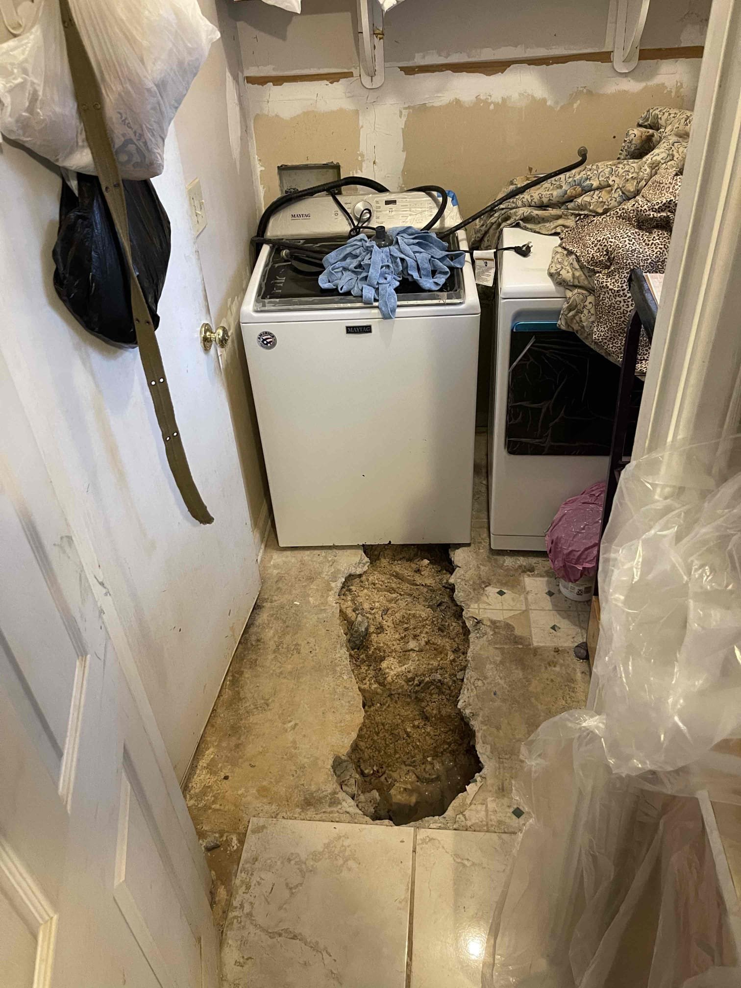 Came out for a slab leak. Homeowner had opened the slab himself. He had polybutylene lines under the slab that were leaking. Customer elected to do a partial repipe and abandon the lines under the slab, as he had previously repaired the polybutylene under the slab. Opened up walls/ceilings where needed. Disconnected water lines from any piping going under the slab. Rerouted everything up inside the ceiling. Replaced the valves to the washing machine box. Turned water on and had no leaks. We realized the toilet in the powder room had no water, and concluded that line also must have ran under the slab. Cut some additional drywall and ran a new line for the toilet. Tested to ensure a leak free install. Water pressure tested in normal range. Water heater was from 2009. Left quote to replace, no further issue at this time. 