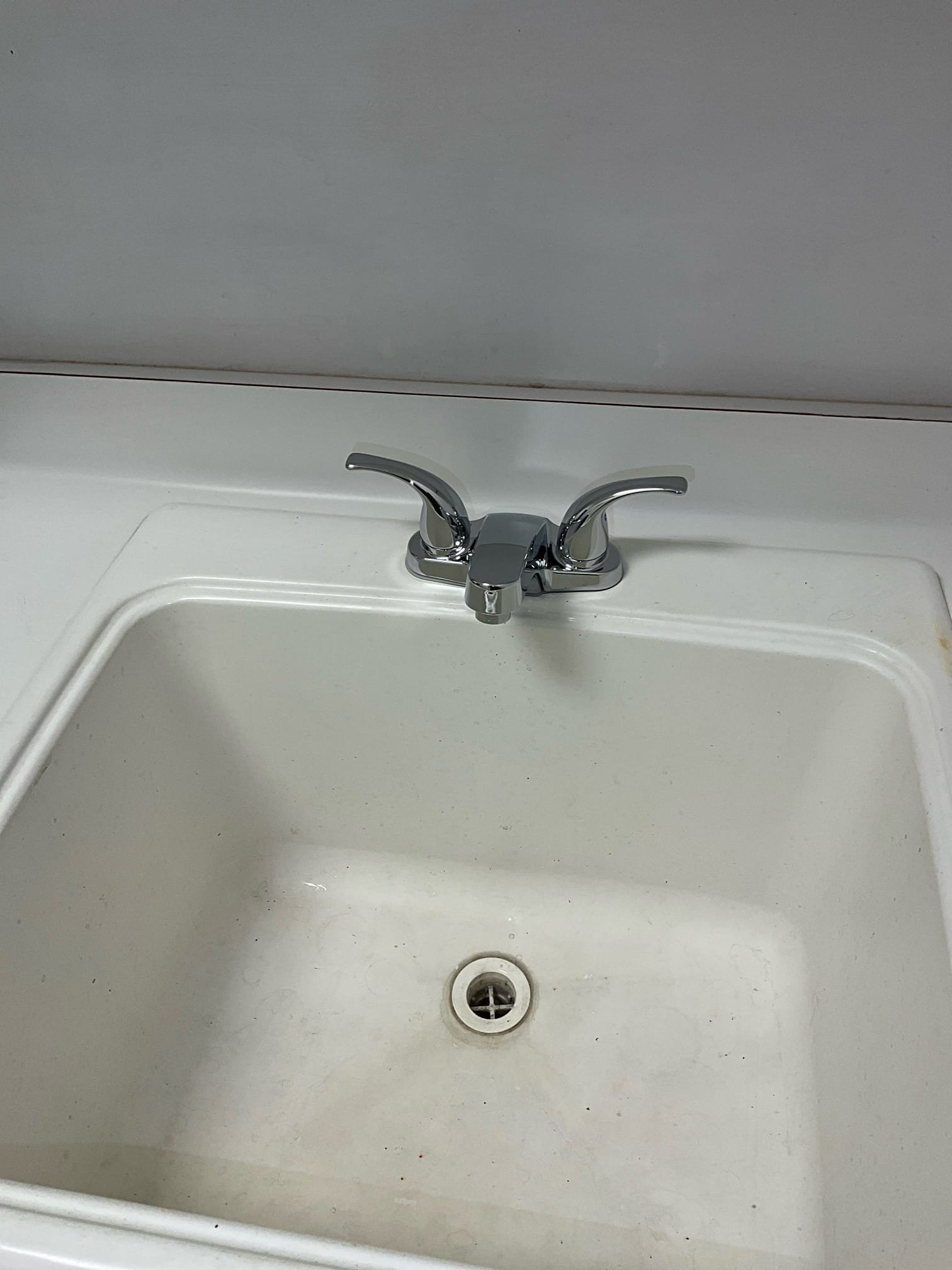 Customer had a leaking stop valve from trying to turn off the stops for utility sink to stop leaking faucet. Replaced both hot and cold stop and thermal faucet in the sink with a new Peerless center spread faucet. Tested all work to ensure proper function and no leak. None were found. Made customer aware that one escutcheon couldn’t fit under the cold stop because there wasn’t enough room. Let customer know that if any issues occur with stop in the future the cabinet would have to be cut to rework. House pressure was 90 psi. Replaced whole house shutoff and prv. House pressure is now at 