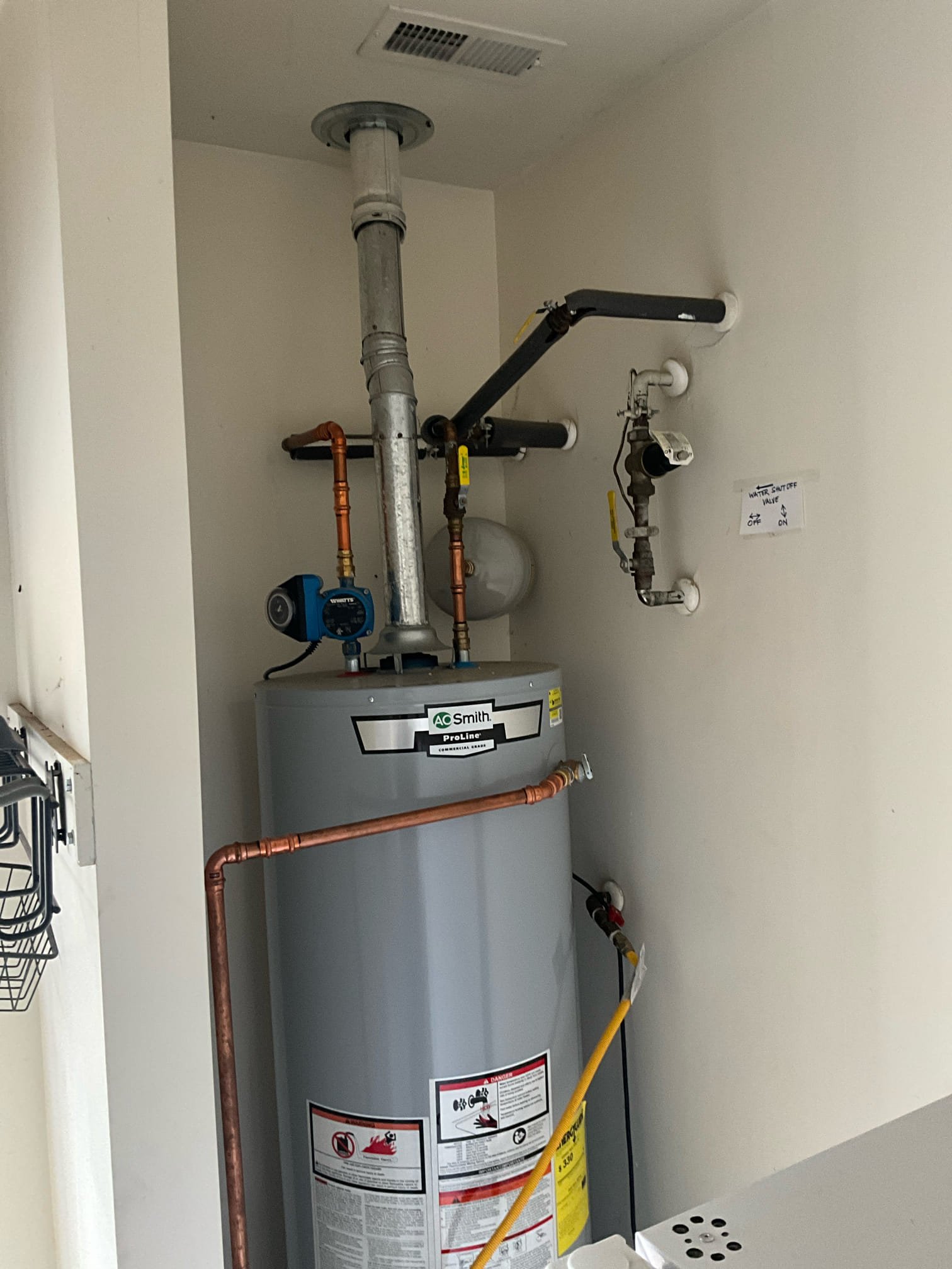 Call for slab leak. See previous invoice for initial call info.

Leak detection has been out and marked the most likely site of a slab leak. 

Used demolition equipment to break floor and concrete, dig down to ruptured pipe. Found a pin hole on a 3/4 copper line. Cut out bad section and replaced with new copper pipe. Pressurized house and checked for leaks. Leak has been repaired. Backfilled hole, applied plastic water barrier. Installed rebar for new concrete. Poured new concrete, and applied correct adhesive to existing concrete wall to help bond new concrete. Concrete is rough grade, and ready for flooring contractor to apply final layer of sealant or self leveling compound if needed.

Cleaned floors, walls, and all work space. Removed plastic and floor protectors. Cleaned mud and clay as best as possible from area surrounding water heater. 

While on site, Mahdu also mentioned pressure problems with a few faucets in the home. We checked hallway bathroom and found two issues, the ho