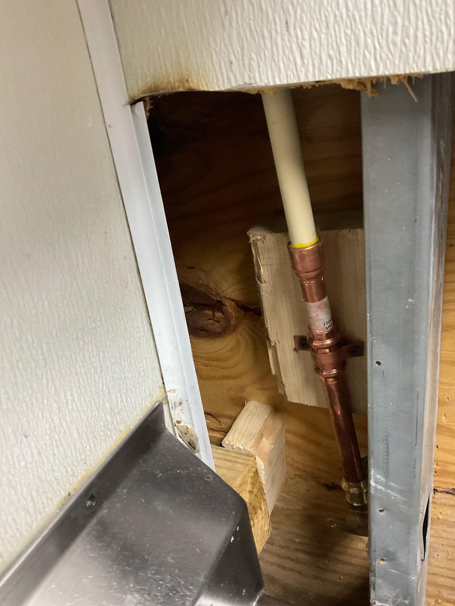 Leak search with wall openned behind and nxt to veggie sink , found a leaking water pipe fitting for mop sink faucet , fixed with copper pipe and fitting , replaced leaking fittings under three comp sink with new shut off valve ,new urinal flush valve installed 