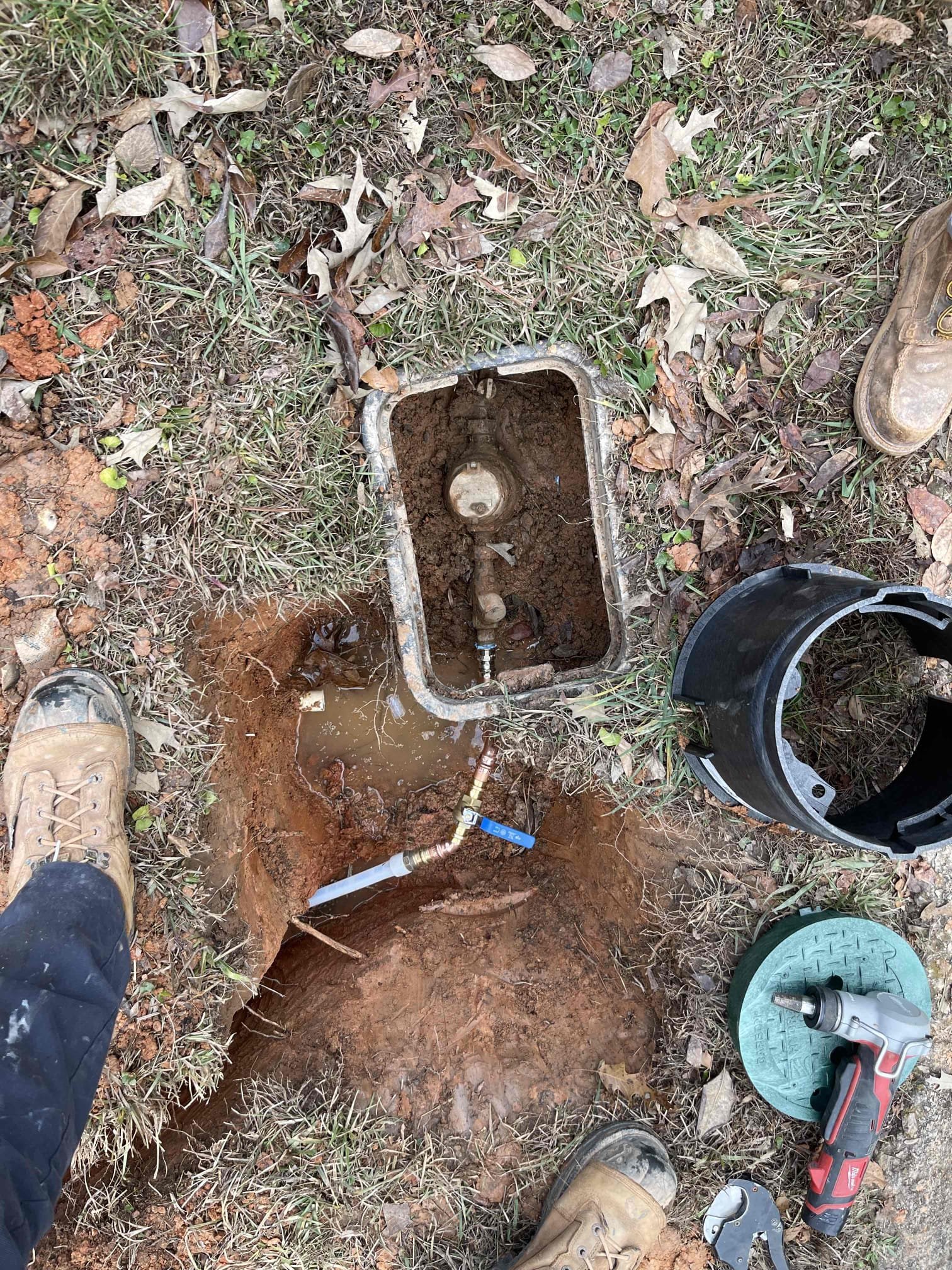 Came out for possible leak. We isolated service line by shutting off main valve. Meter continued to slowly keep spinning. Concluded there was a minor leak somewhere on the service line. Due to how small the leak was, it was going to be very difficult to locate the leak under the slab. Customer elected to have us replace the service line. Trenched from meter to side of house, drilled down through slab and ran water service up into garage. Installed new shut off valve and PRV. Ran waterline across attic over garage, reconnected back into existing plumbing going into the slab. Replace both shut off valves going to the hose bibs as they were actively leaking inside the wall. Wrapped all exposed piping with insulation. Pressurized line to ensure a leak free install. Back filled service line outside. No further issue at this time. 