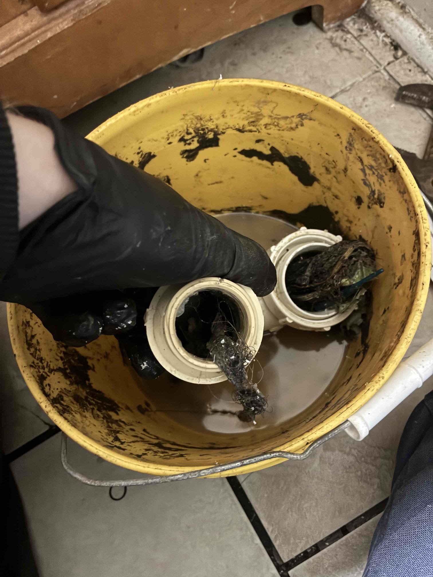 Tenant stated that lavatory faucet upstairs in hall bath wasn’t draining. Took a look and found that lavatory wasn’t draining and also leaking from joints on drain. Recommend to customer to clean drain pipe and replace section of pipe and customer agreed. Went ahead and cut out section of piping and cleaned out drain. Pulled out lots of different debris including hair. Installed new piping and now sink is draining as it should and no leaks on the drain. Did find water leaking on faucet itself when on and recommend customer to have faucet replaced. Will send estimates to do so. Also tenant mentioned that in garage water was coming through ceiling. At this time stated to customer that most likely water came through ceiling was the water that was leaking from drain. Recommended that if spot on ceiling get worse we will need to cut. In bath upstairs ran water at all fixtures and flushed toilet multiple times and didn’t notice any other backing up/leaking. Cleaned up work area. Chen plumbin