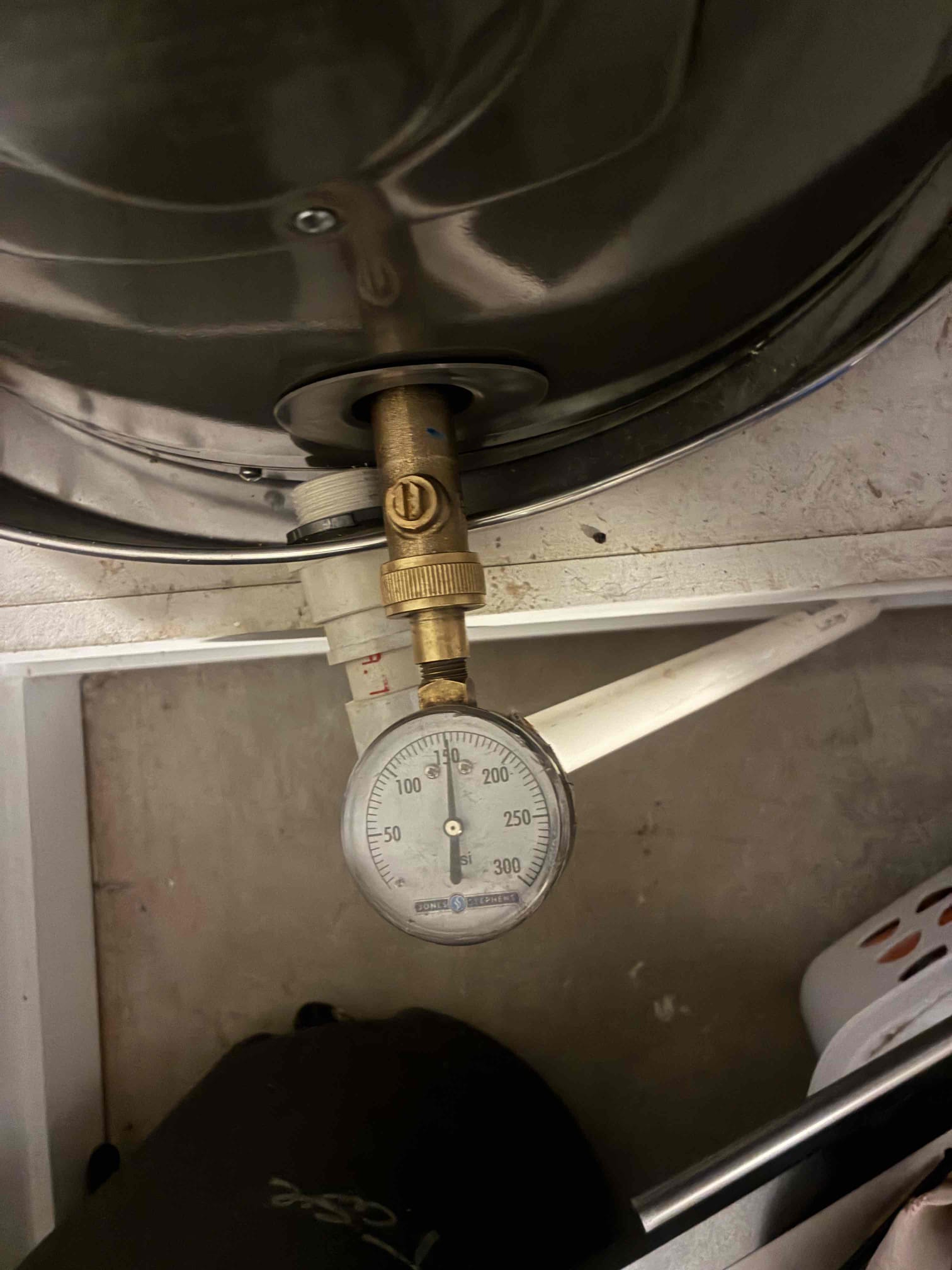 Customers toilet seat was loose. Unloosed toilet seat. Cleaned and reset seat. Checked pressure and found pressure to be at 150 PSI. Options to replace PRV and install thermal expansion tank. Customer did not want to do work at this time. Showed tenant secured toilet seat. 