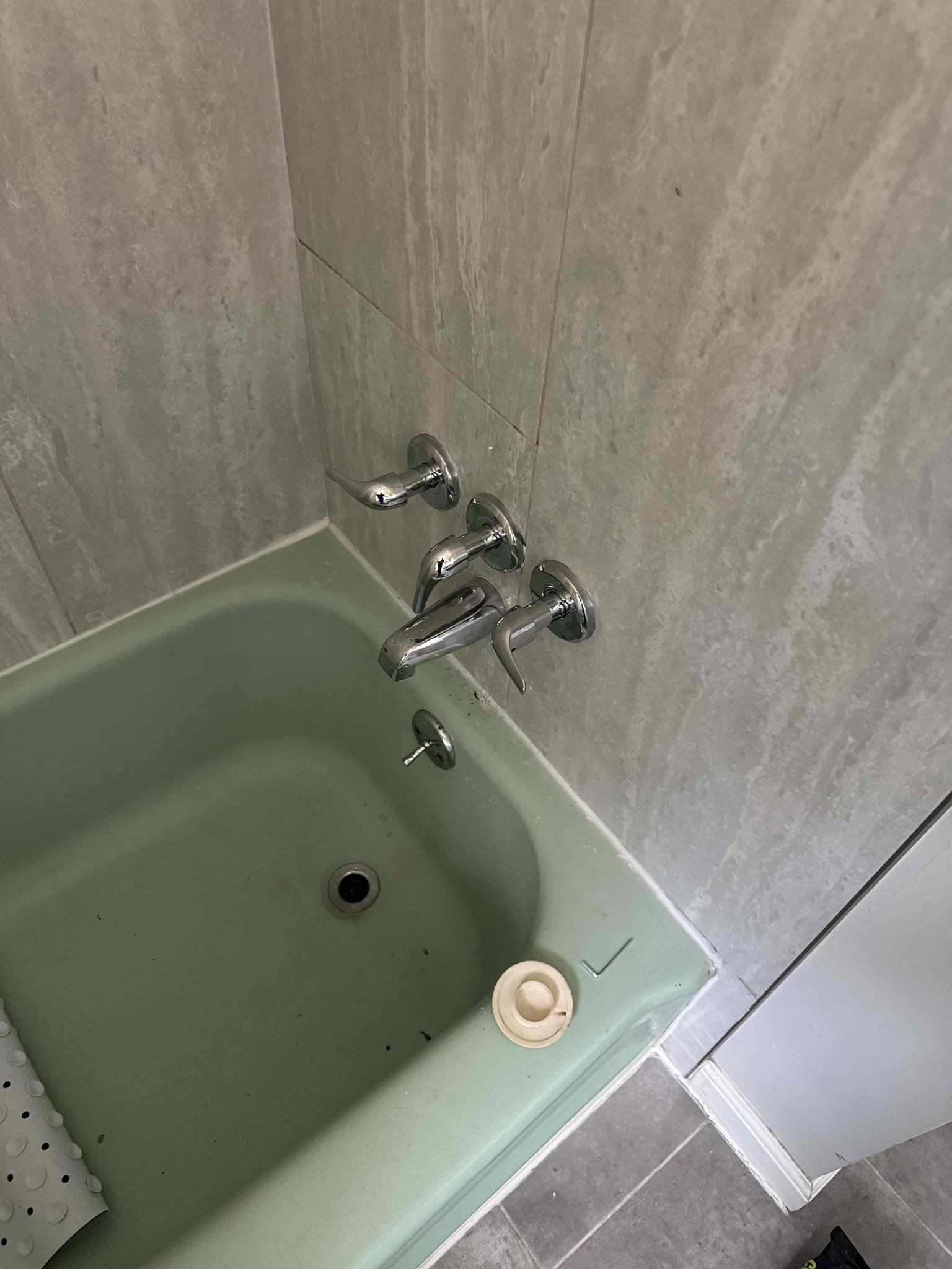 Customer accepted estimate to switch three handle shower valve to one single handle shower valve. Stated to customer that with the cover plate, it would look awkward and possibly may not even fit. Gave customer option just to install new three handle shower valve and customer agreed. Furnished and installed new three handle shower valve. Also replaced half-inch copper piping both hot and cold up to shower valve. Tested and no leaks were present at this time. Cleaned up work area and caulked around trim. 
Chen plumbing is not responsible for sheet rock repair