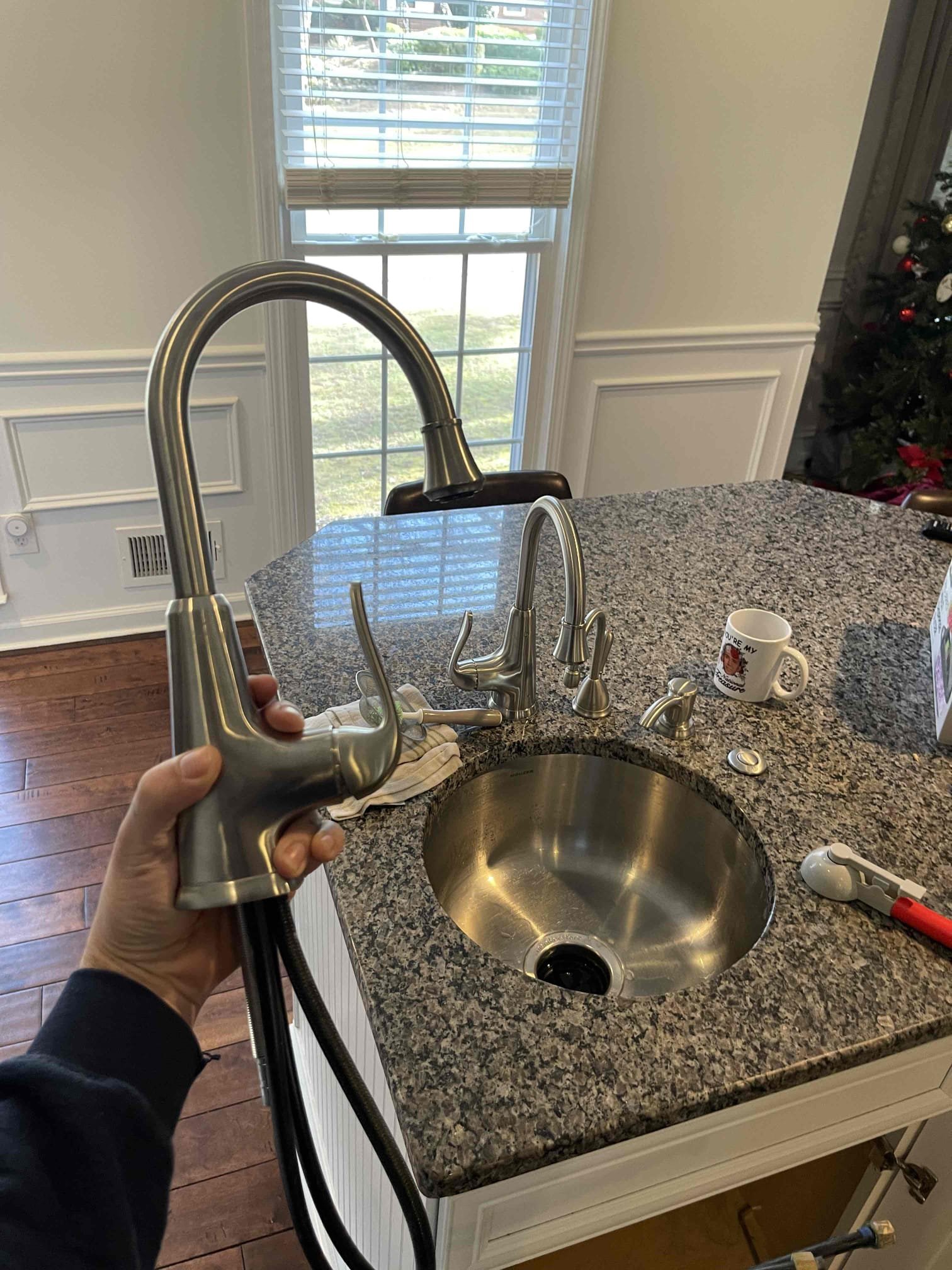 Kitchen faucet leaking out the handle. Customer had new faucet to install, same model. Upstairs toilet had a bad gasket for the flush valve. Confirmed with a dye test. Purchased proprietary part and replaced gasket and fill valve. Re did dye test after installing parts and this corrected the ghost flushes. Replaced pop up on downstairs sink with part customer provided. Tested to ensure proper function and a leak free install. 