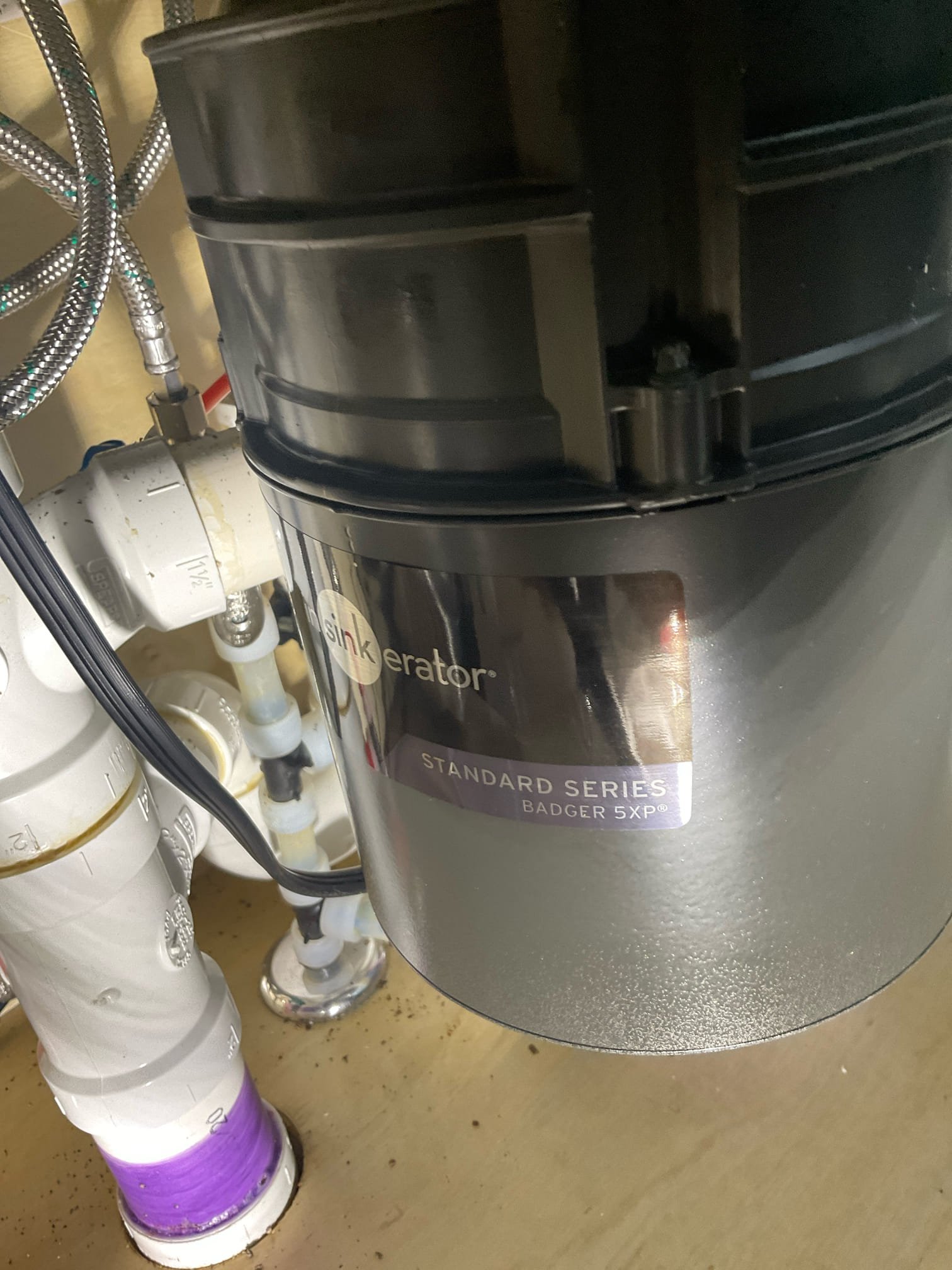 Tankless flush , replace and relocate main water shut off valve and Prv , replaced a leaking disposal with insinkerator 3/4 hp disposal 